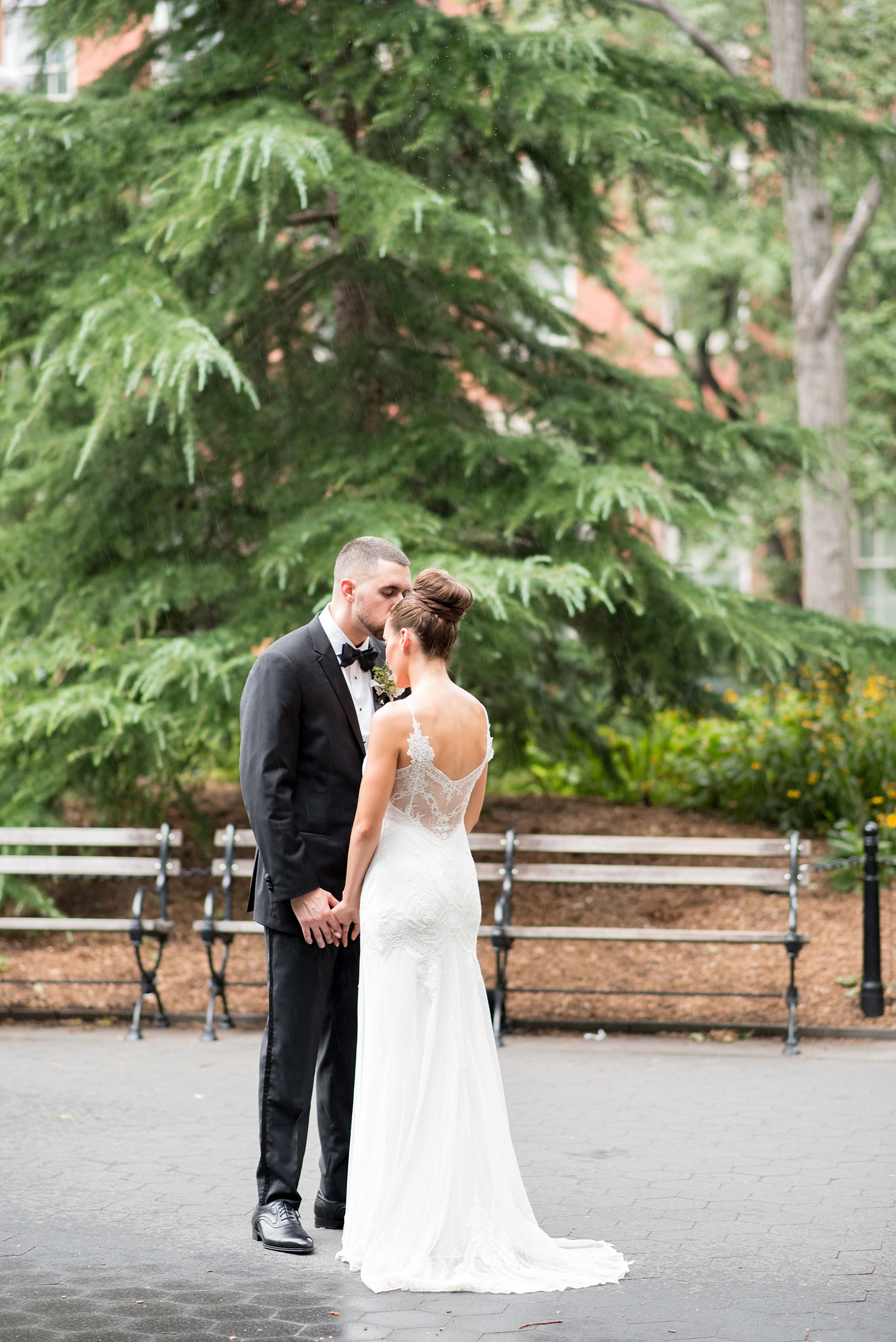 Mikkel Paige Photography photos of a luxury wedding in NYC. Image of the bride and groom in Washington Square Park.