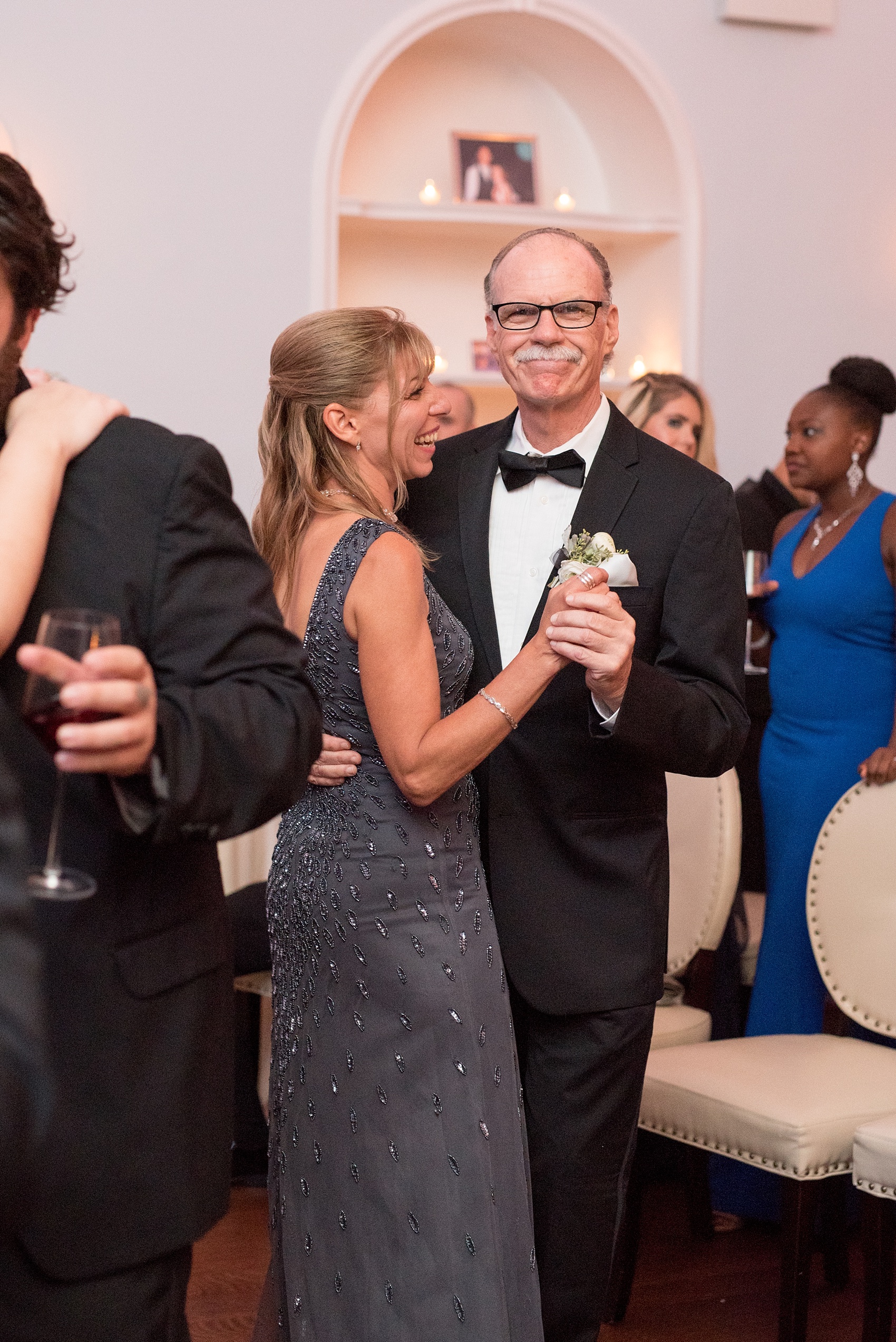 Mikkel Paige Photography photos of a luxury wedding in NYC. Image of guests dancing at an India House reception in lower Manhattan.