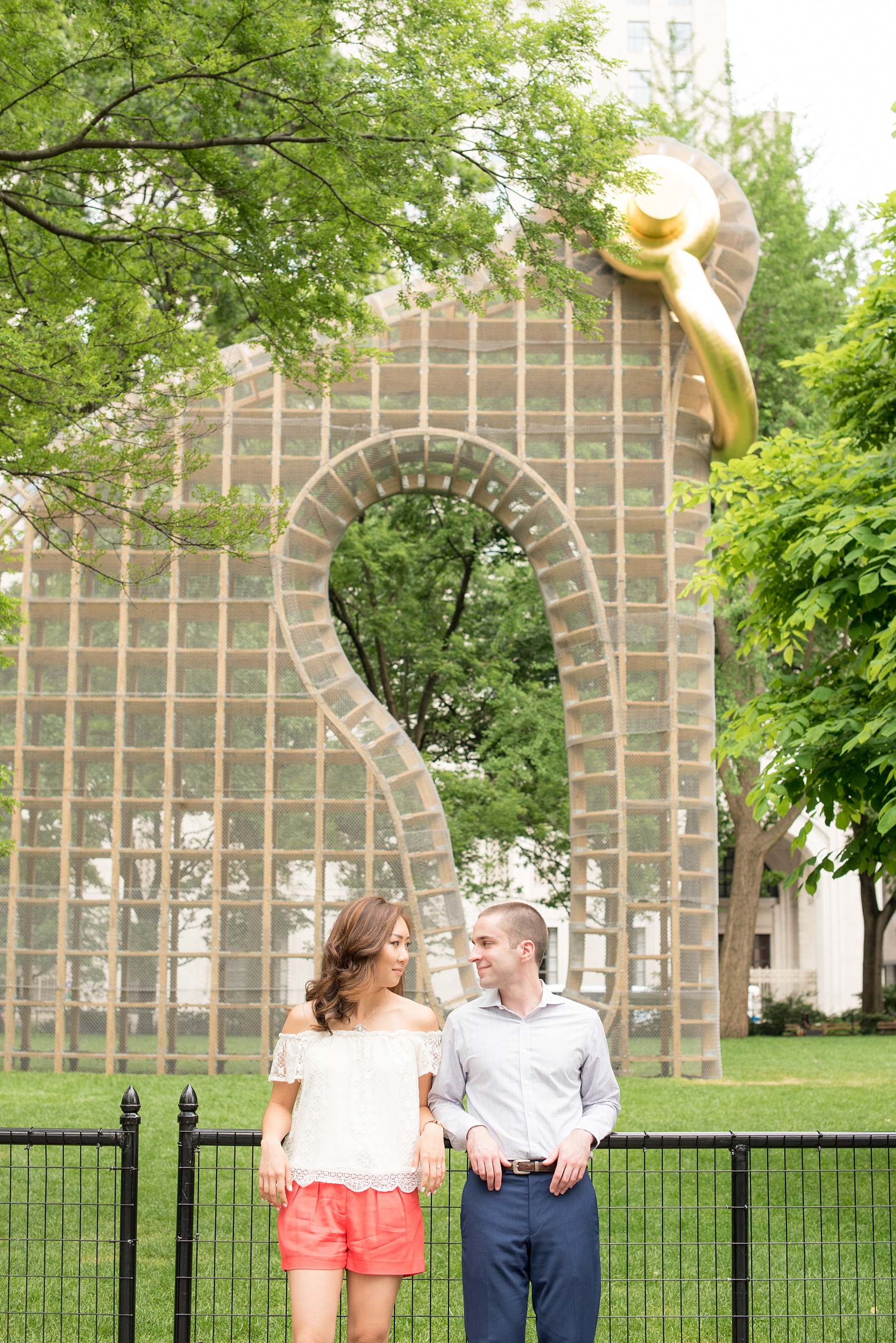 Mikkel Paige Photography photos of a Madison Square Park engagement session in NYC during spring.