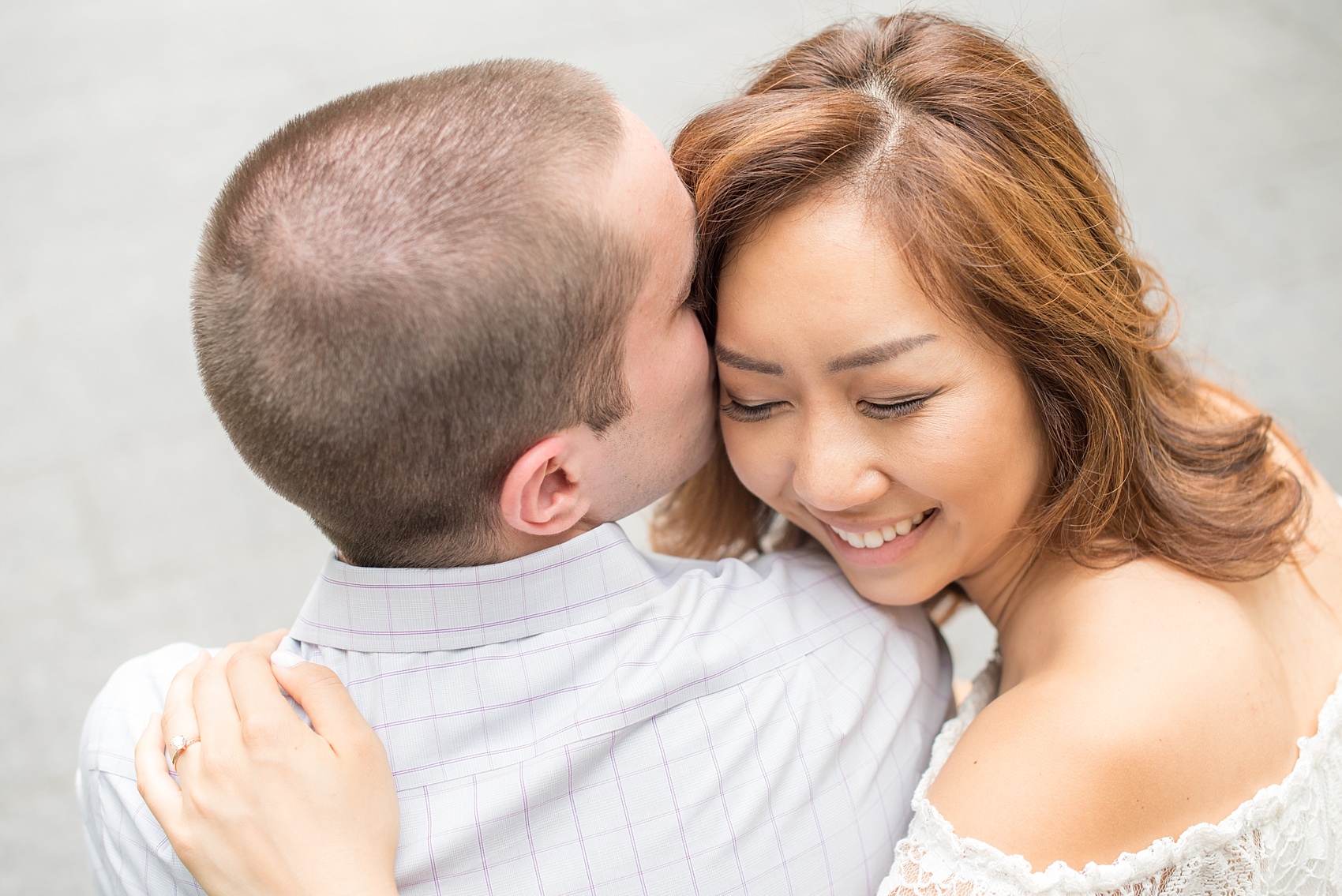 Mikkel Paige Photography photos of a Madison Square Park engagement session in NYC during summer time.