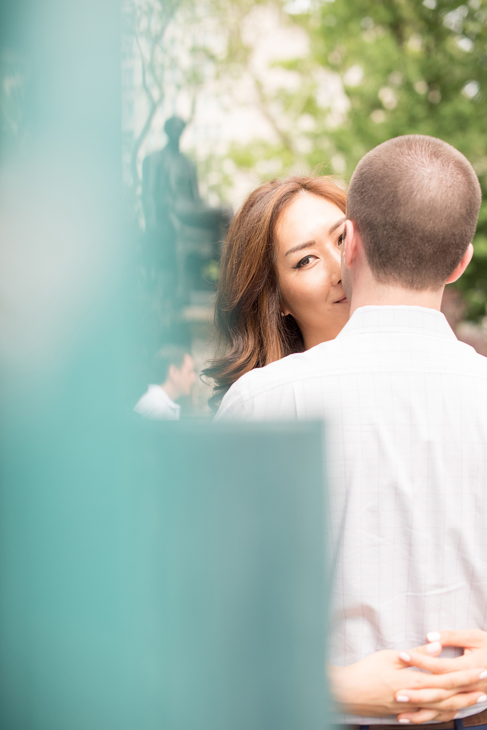 Mikkel Paige Photography photos of a Madison Square Park engagement session in NYC by the subway entrance.