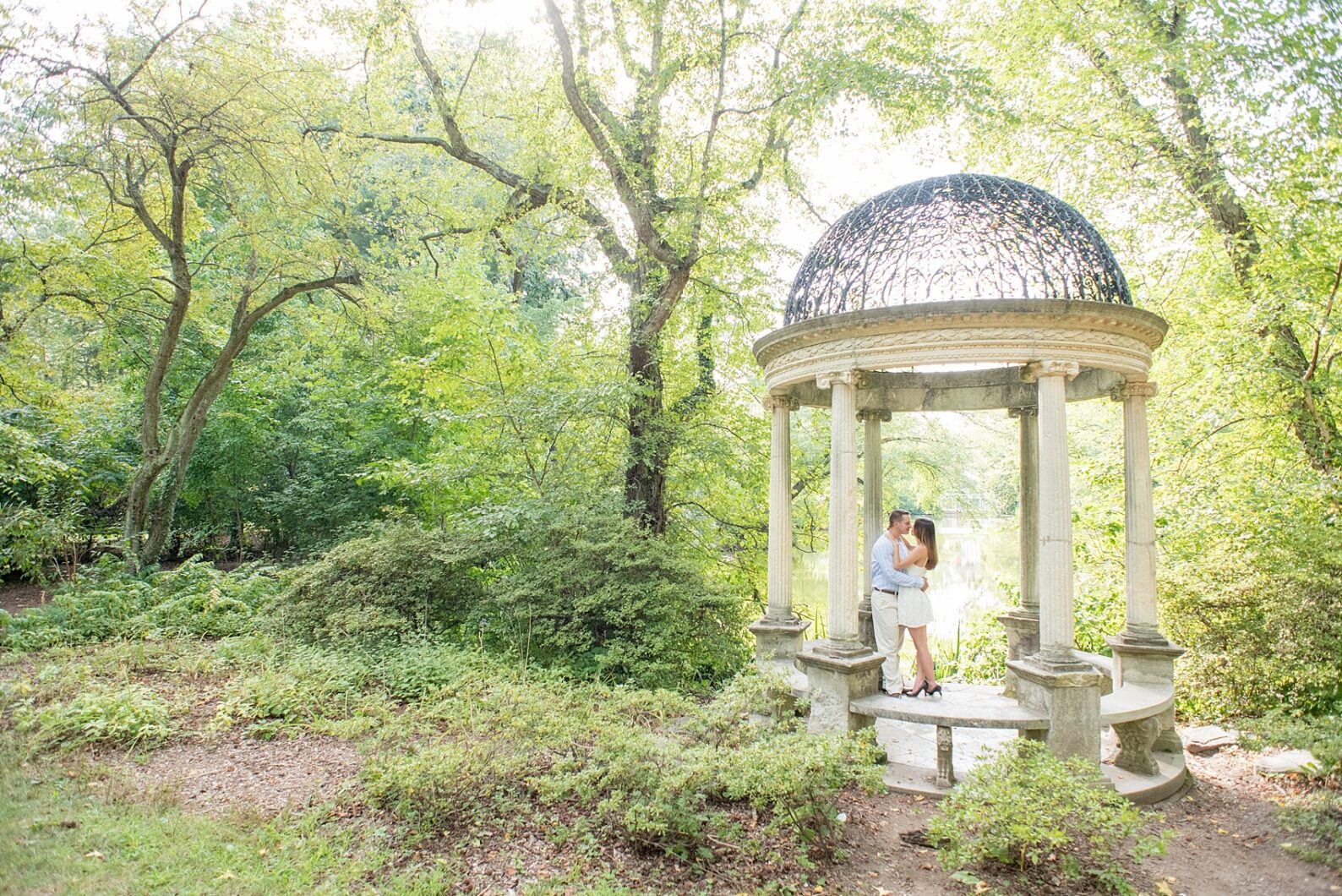 Mikkel Paige Photography photo of an Old Westbury Gardens engagement session on Long Island in the "temple of love" lakeside location.