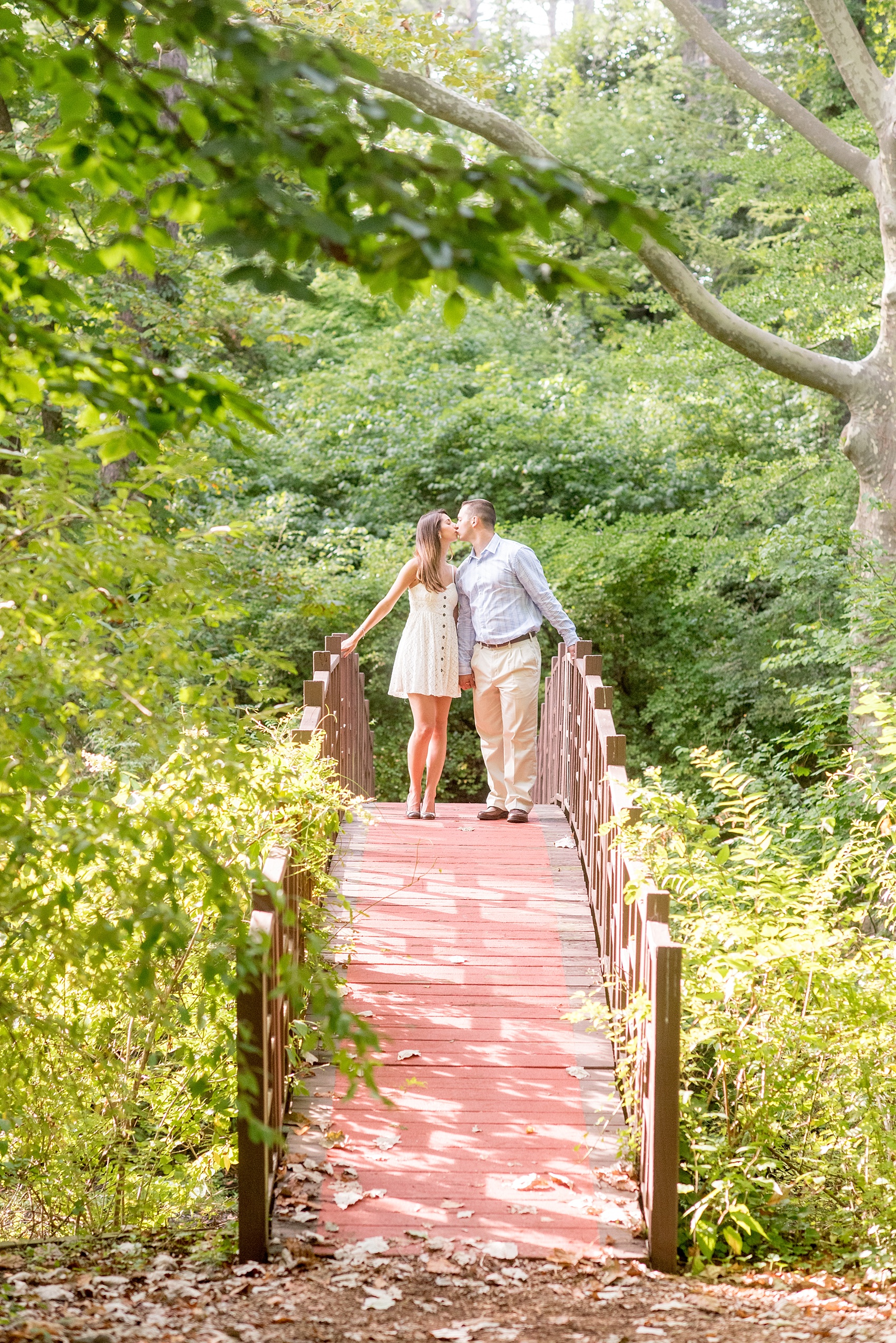 Mikkel Paige Photography bridge photo at an Old Westbury Gardens engagement session on Long Island.