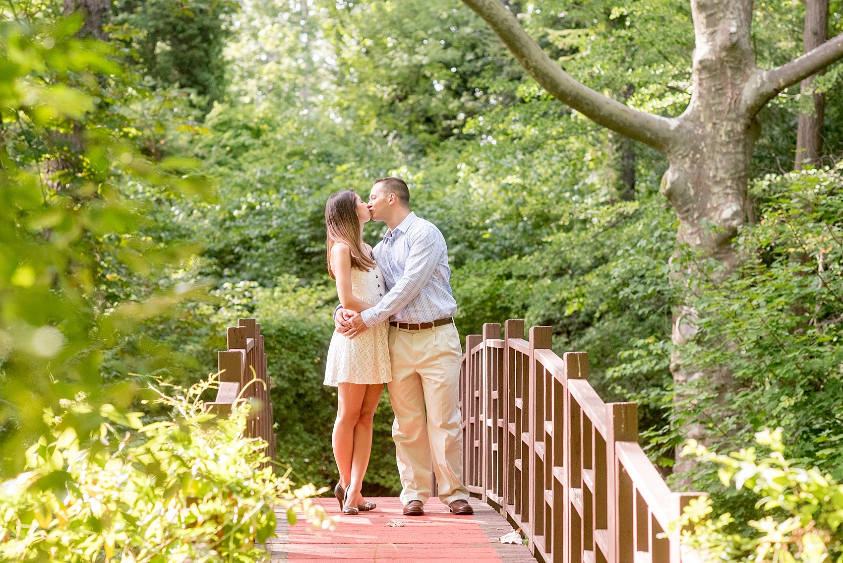 Mikkel Paige Photography bridge photo at an Old Westbury Gardens engagement session on Long Island.