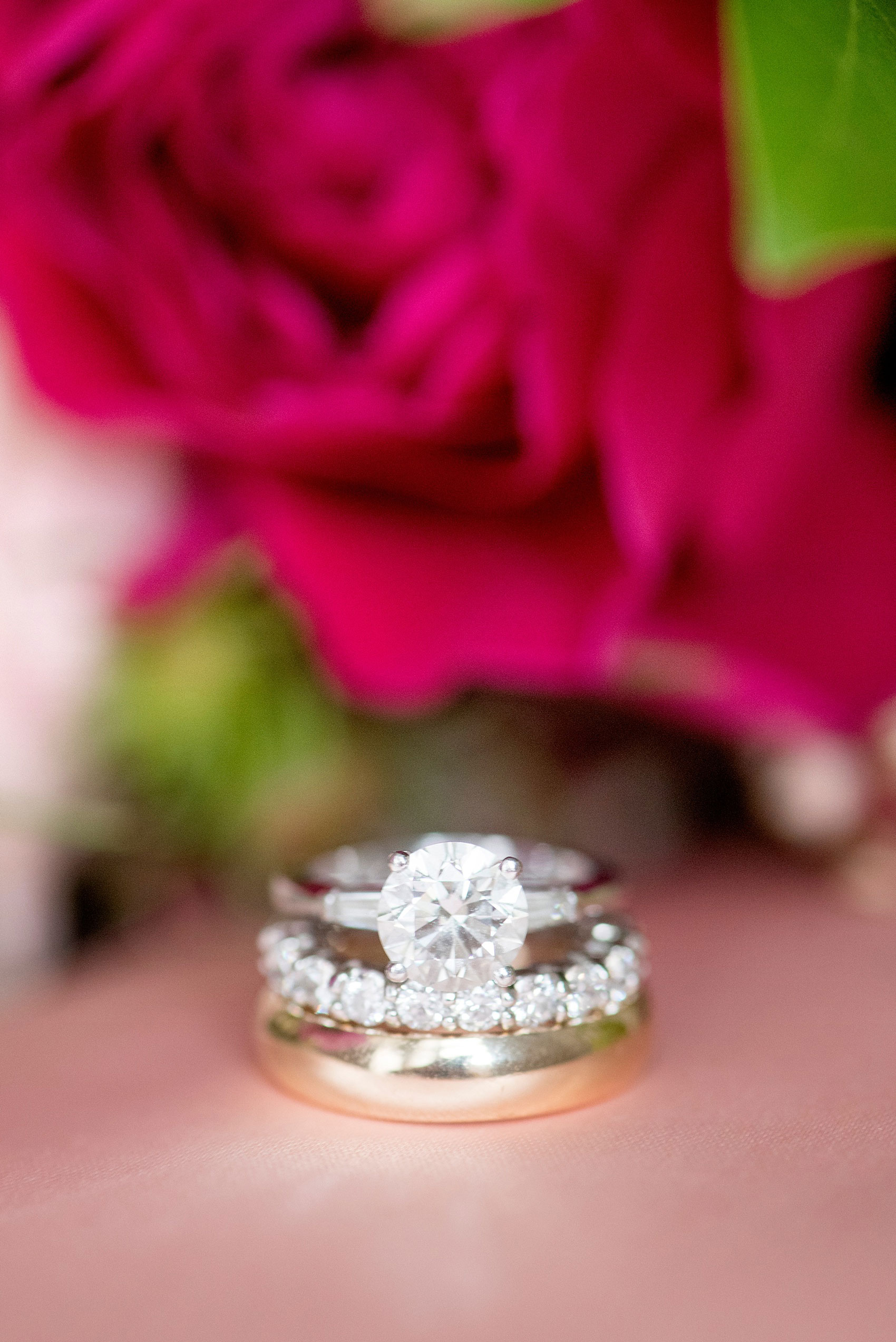 Mikkel Paige Photography photos from a wedding at Prospect Park Boathouse in Brooklyn, NY. Image of the bride and groom's diamond and gold wedding rings.