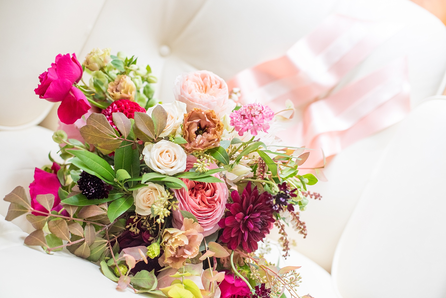 Mikkel Paige Photography photos of a wedding at Prospect Park Boathouse in Brooklyn, NY. Colorful pink bridal bouquet by Sachi Rose.