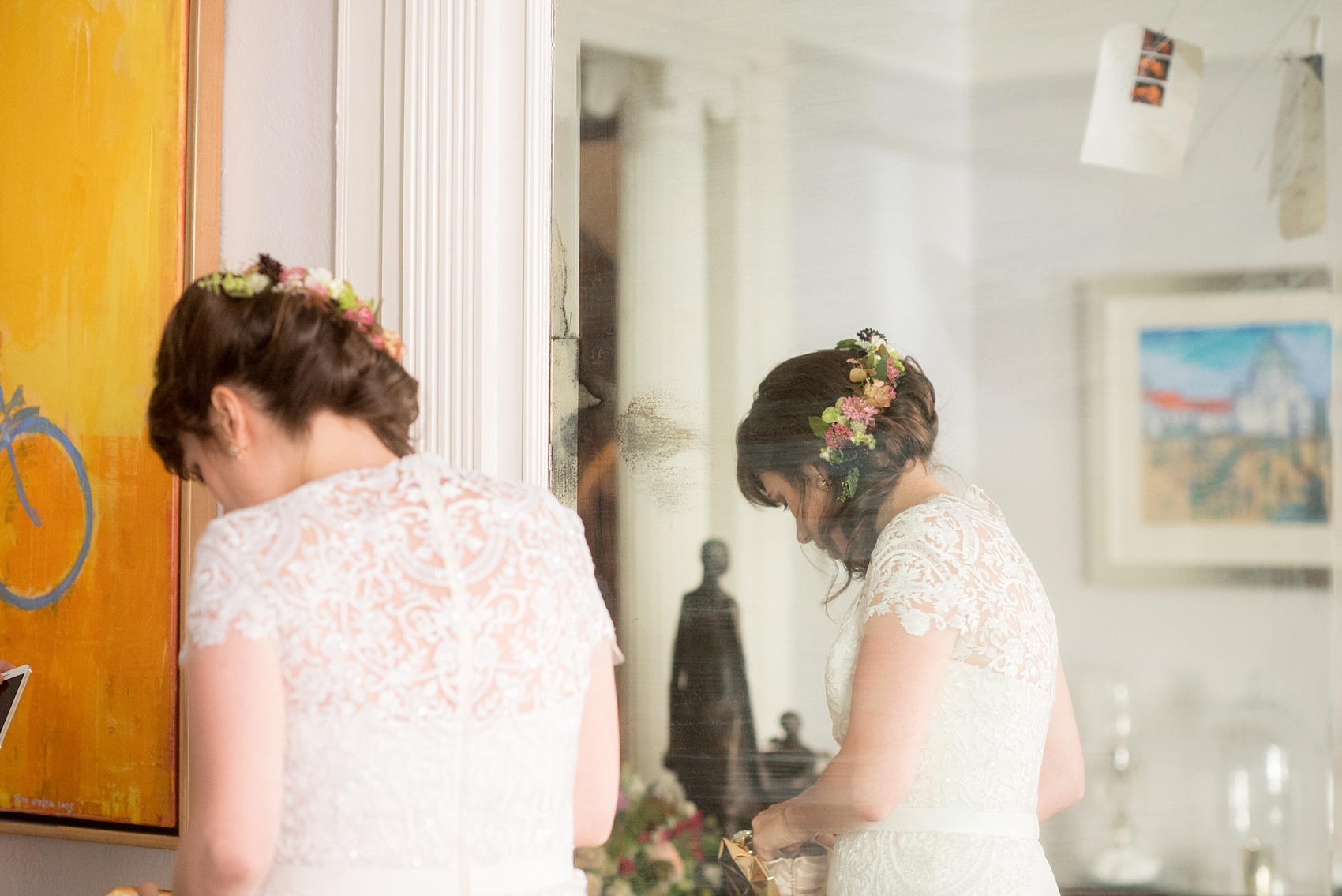 Mikkel Paige Photography photos of a wedding at Prospect Park Boathouse in Brooklyn, NY. A candid picture of the bride getting ready for her first look.