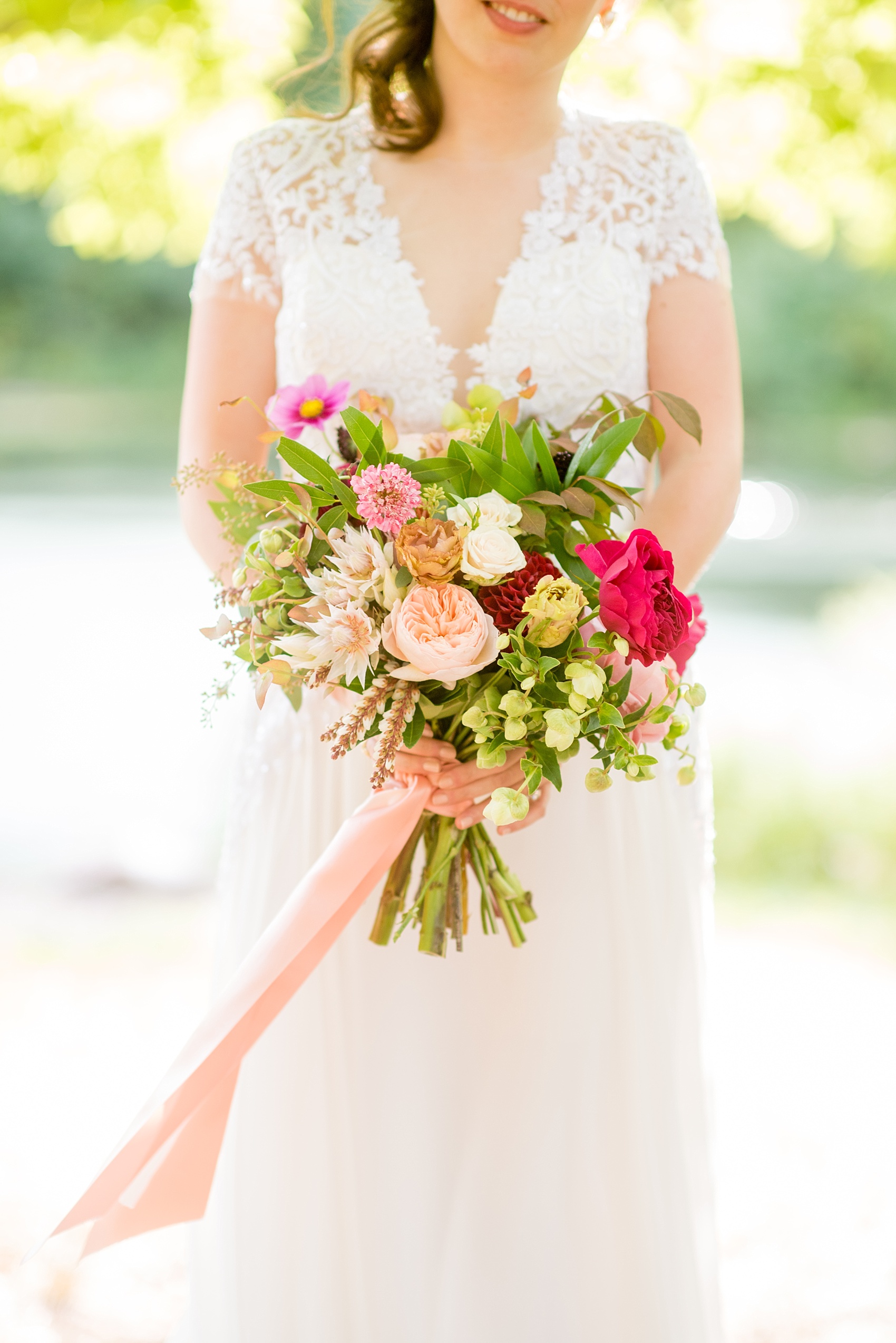 Mikkel Paige Photography photos of a pink and blush bridal bouquet for a wedding at Prospect Park Boathouse in Brooklyn, NY. Floral design by Sachi Rose.