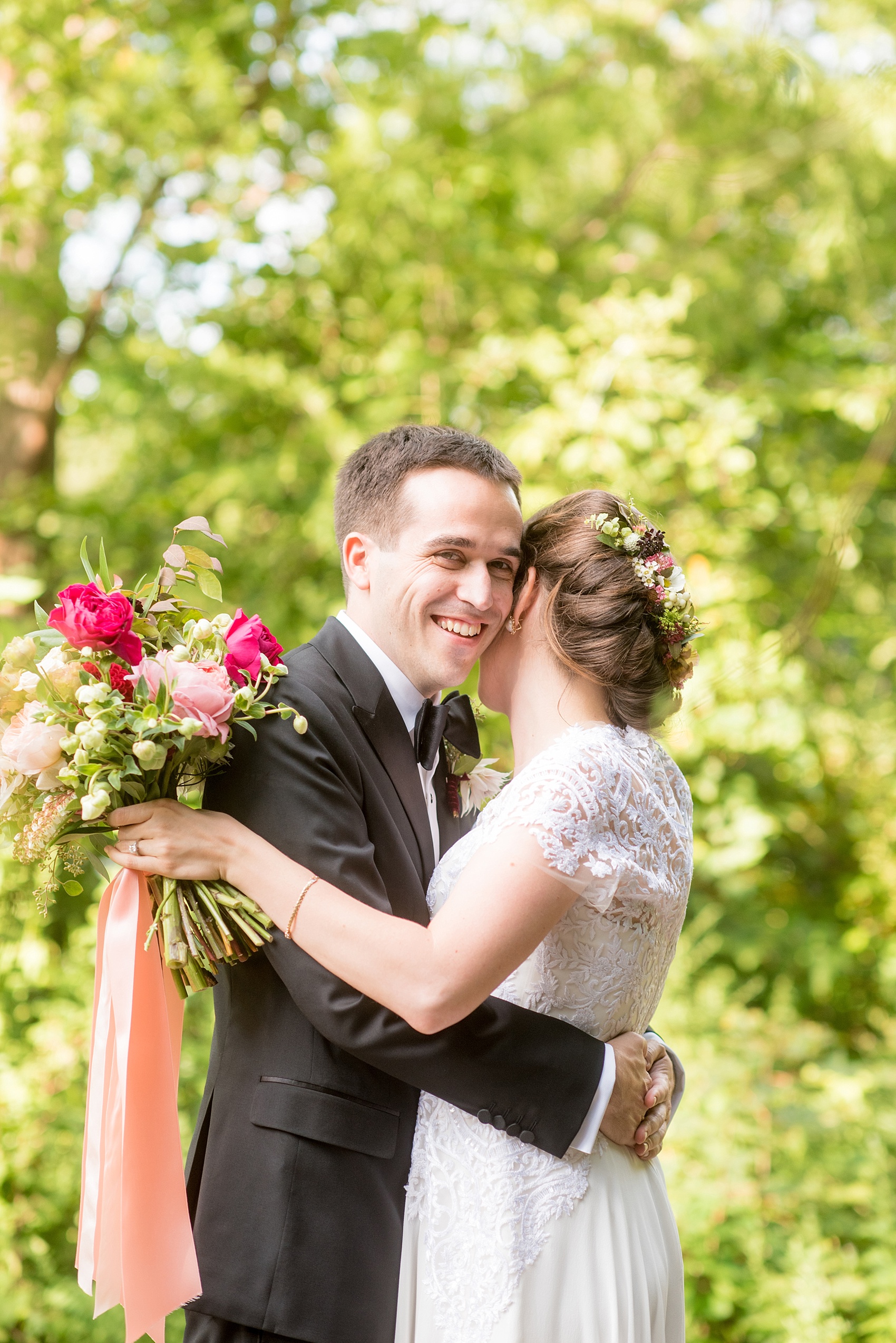 Mikkel Paige Photography candid photos of a bride and groom at their wedding at Prospect Park Boathouse in Brooklyn, NY. The bride wore a Reem Acra gown. Flower combs and bouquet by Sachi Rose.