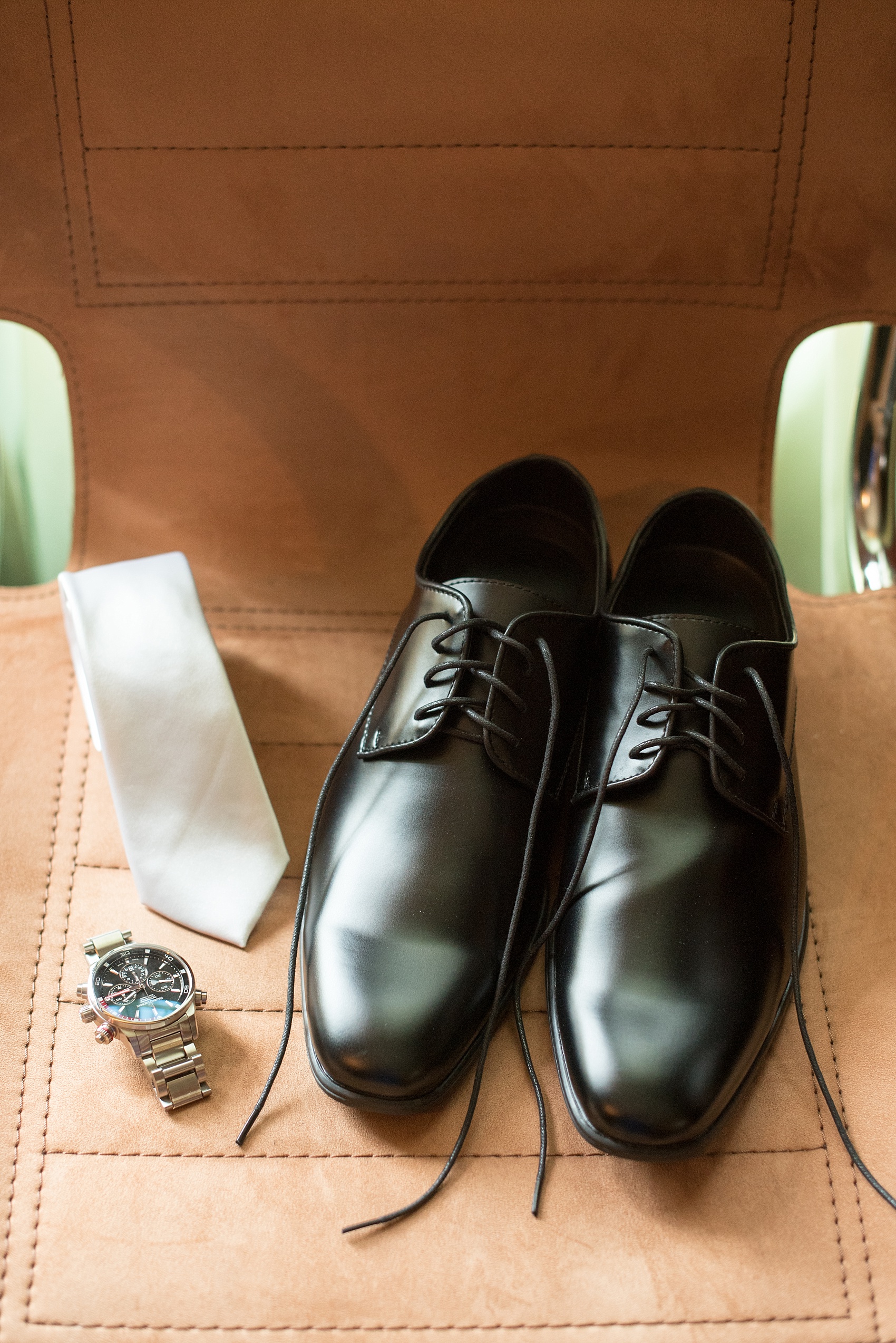 Mikkel Paige Photography photo of the groom's details at Hotel Los Gatos California for a wedding at Testarossa Winery.