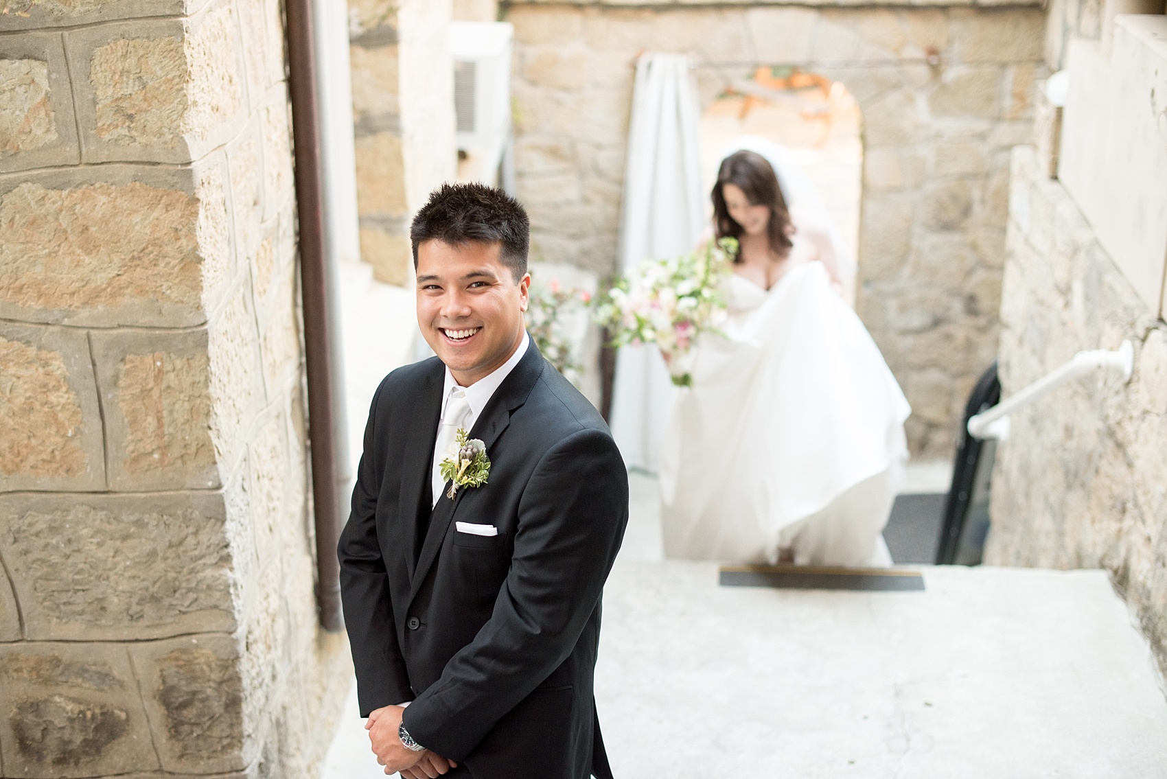 Mikkel Paige Photography photo of the bride and groom's first look for their wedding at Testarossa Winery in Los Gatos, California.