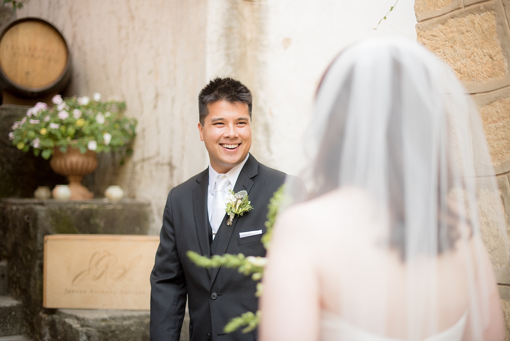 Mikkel Paige Photography photo of the bride and groom's first look for their wedding at Testarossa Winery in Los Gatos, California.