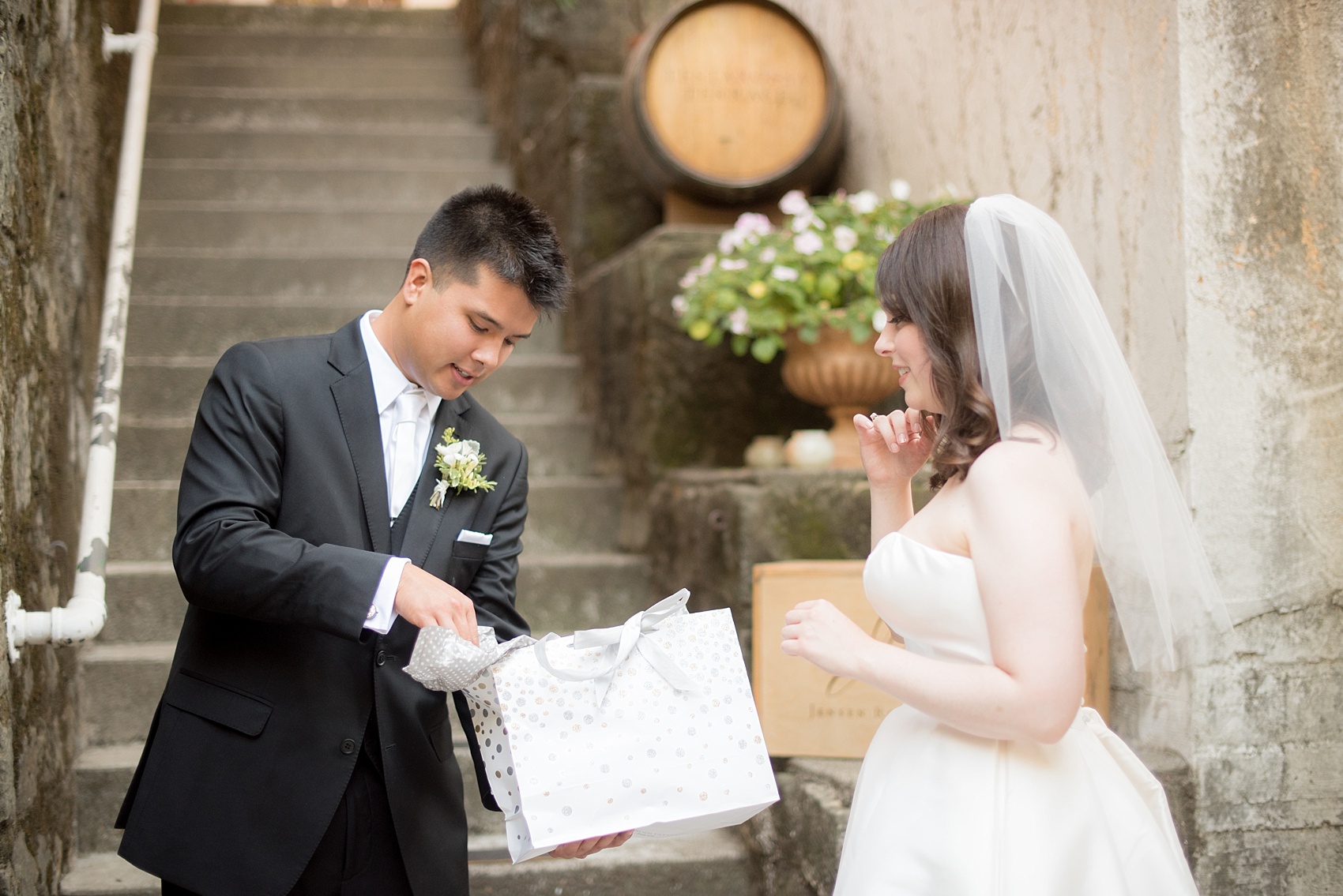 Mikkel Paige Photography photo of the bride and groom's first look for their wedding at Testarossa Winery in Los Gatos, California.