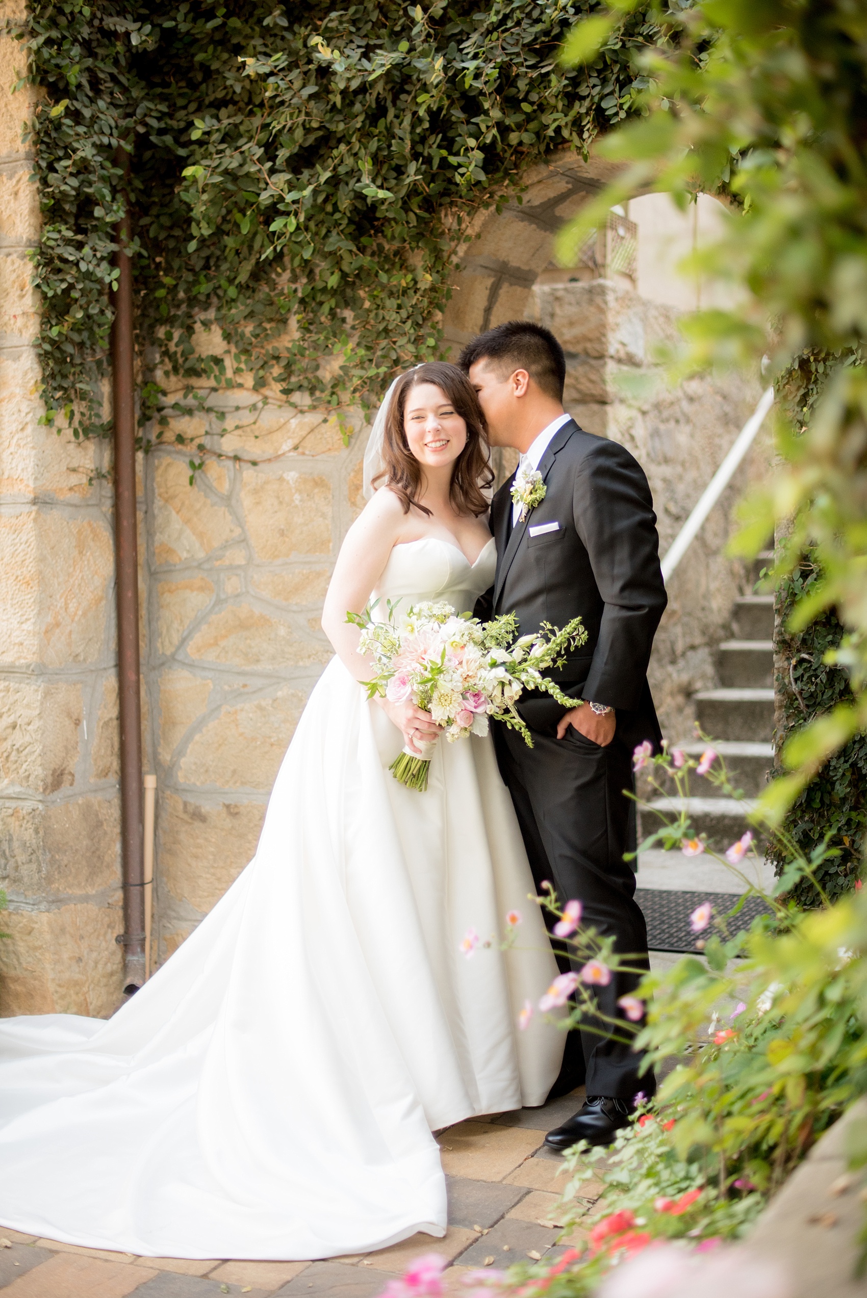 Mikkel Paige Photography photo of the bride and groom at their wedding at Testarossa Winery in Los Gatos, California.