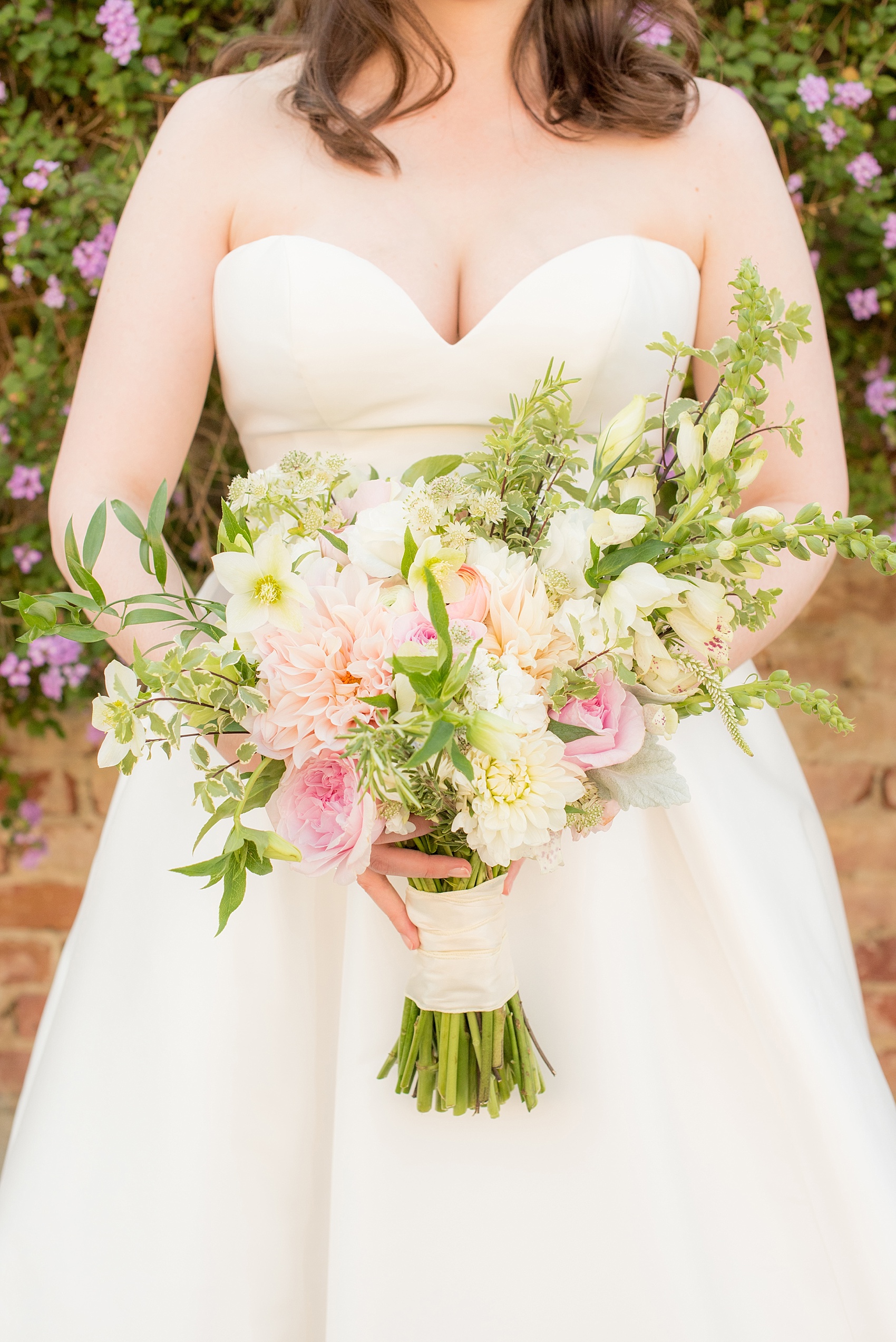 Mikkel Paige Photography photo of the bride's pink and green bridal bouquet for her wedding at Testarossa Winery in California, with garden roses, Dusty Miller, Veronica, Dahlias and Hellebore.