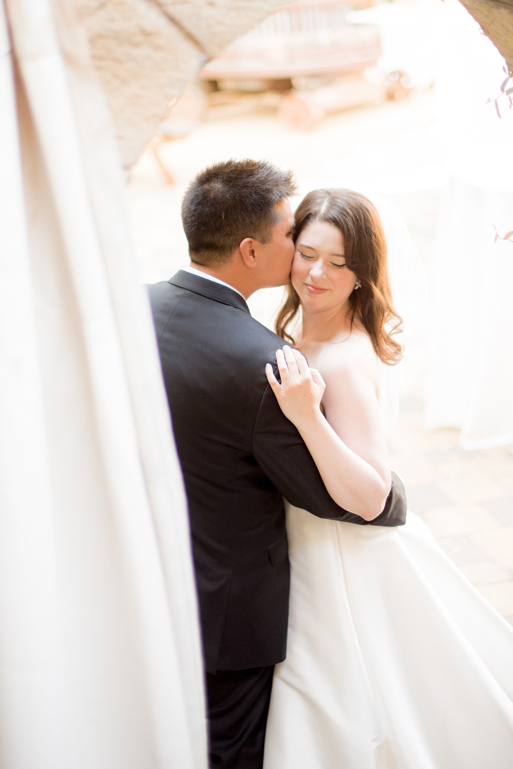 Mikkel Paige Photography photo of the bride and groom at their wedding at Testarossa Winery in Los Gatos, California.