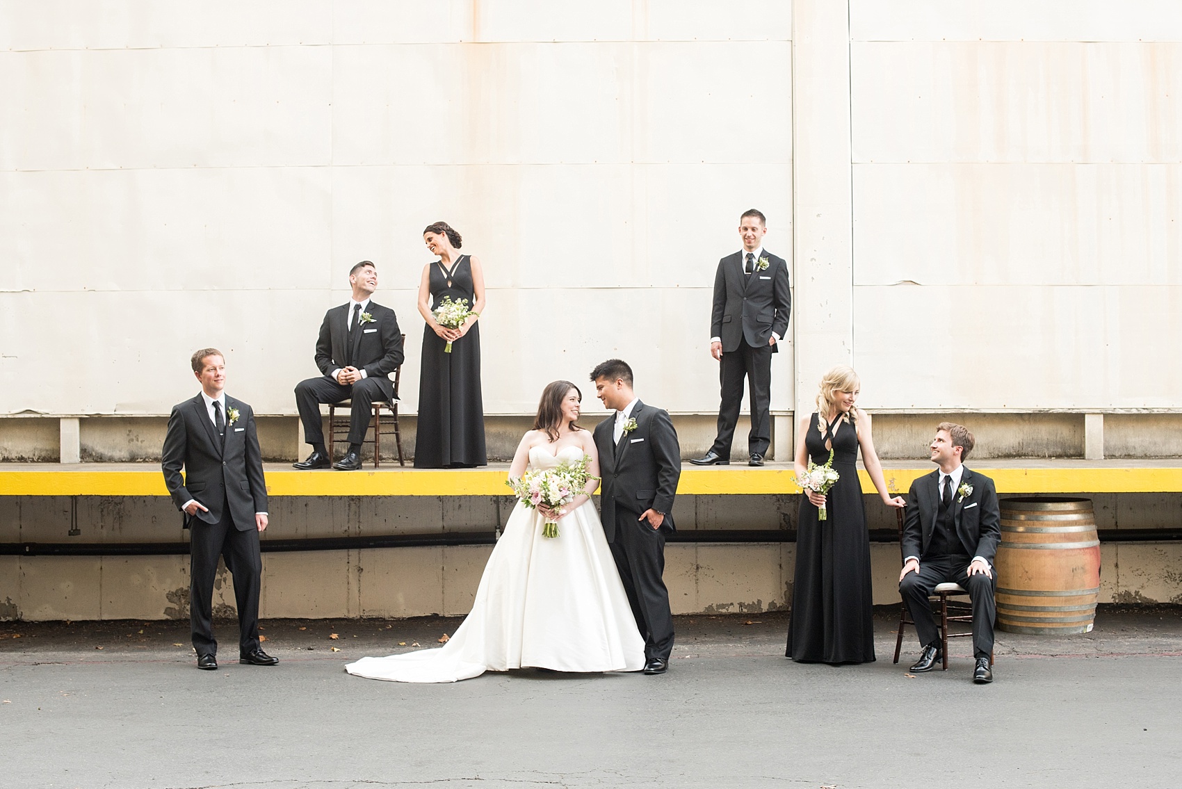 Mikkel Paige Photography Vogue photo of the bride and groom and their bridal party at a Testarossa Winery wedding in Los Gatos, California.