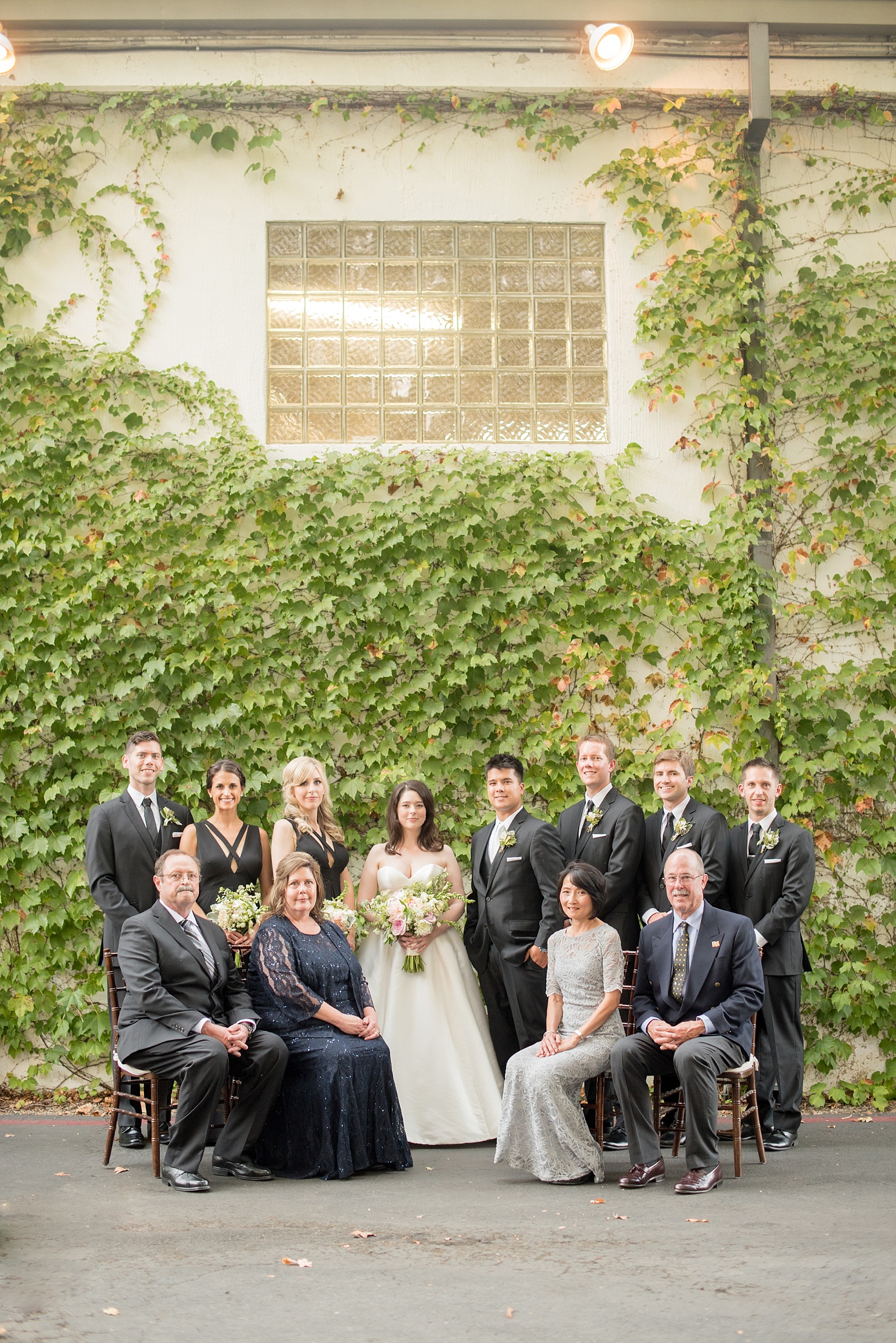 Mikkel Paige Photography photo of bridal party and the bride and groom's parents at a wedding at Testarossa Winery in Los Gatos, California.