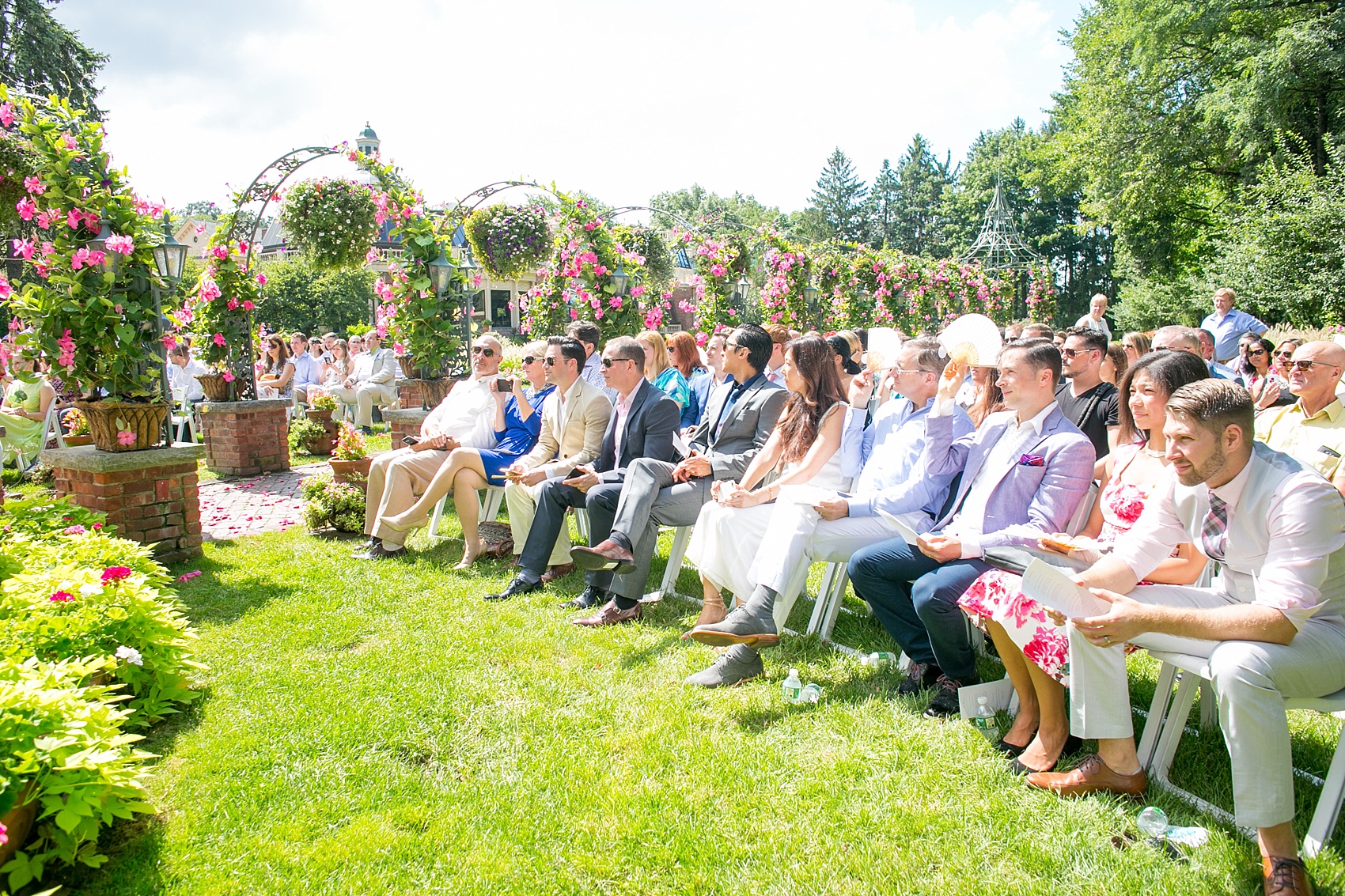 Mikkel Paige Photography photos of a gay wedding at The Manor in West Orange, NJ. The grooms had an outdoor ceremony.