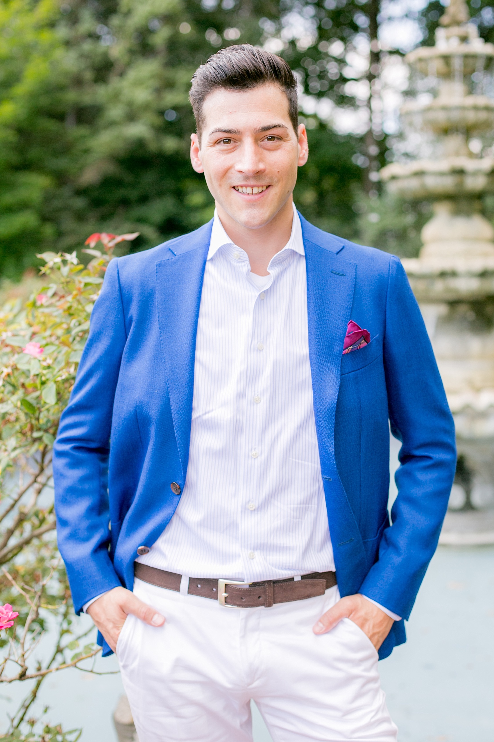 Mikkel Paige Photography photos of a summer, daytime gay wedding. An image of the groom in a blue suit at The Manor, in West Orange New Jersey.