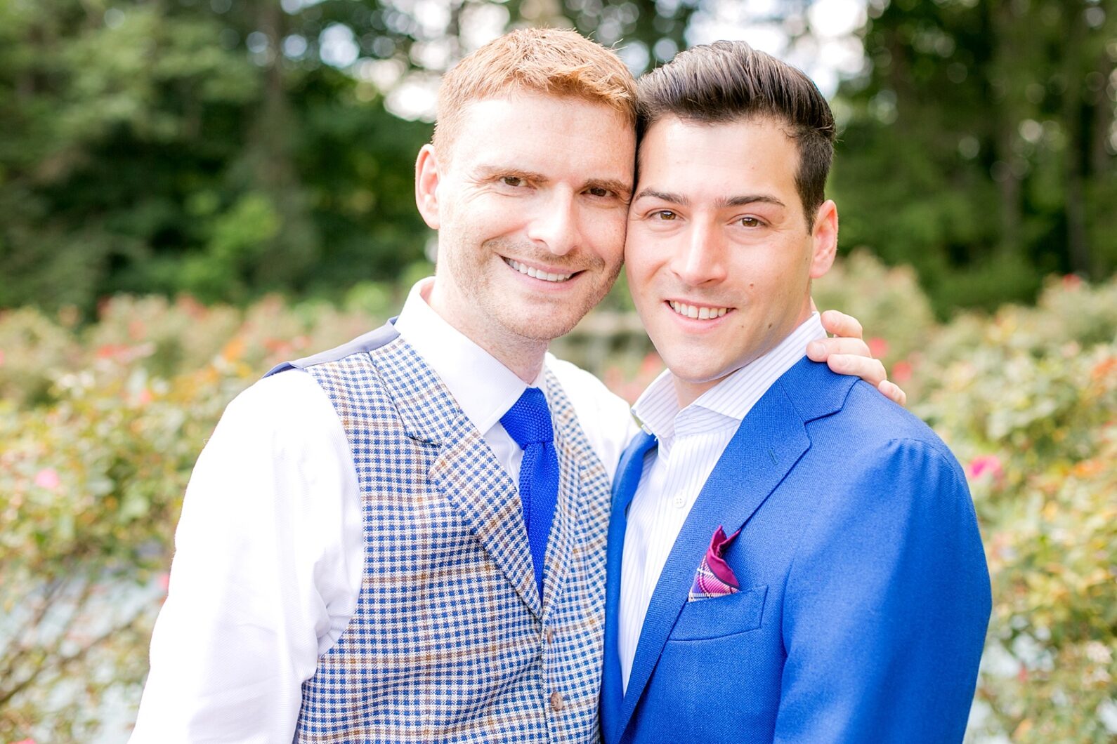 Mikkel Paige Photography photos of a summer, daytime gay wedding. An image of the grooms in a vest and blue suit at The Manor, in West Orange New Jersey.