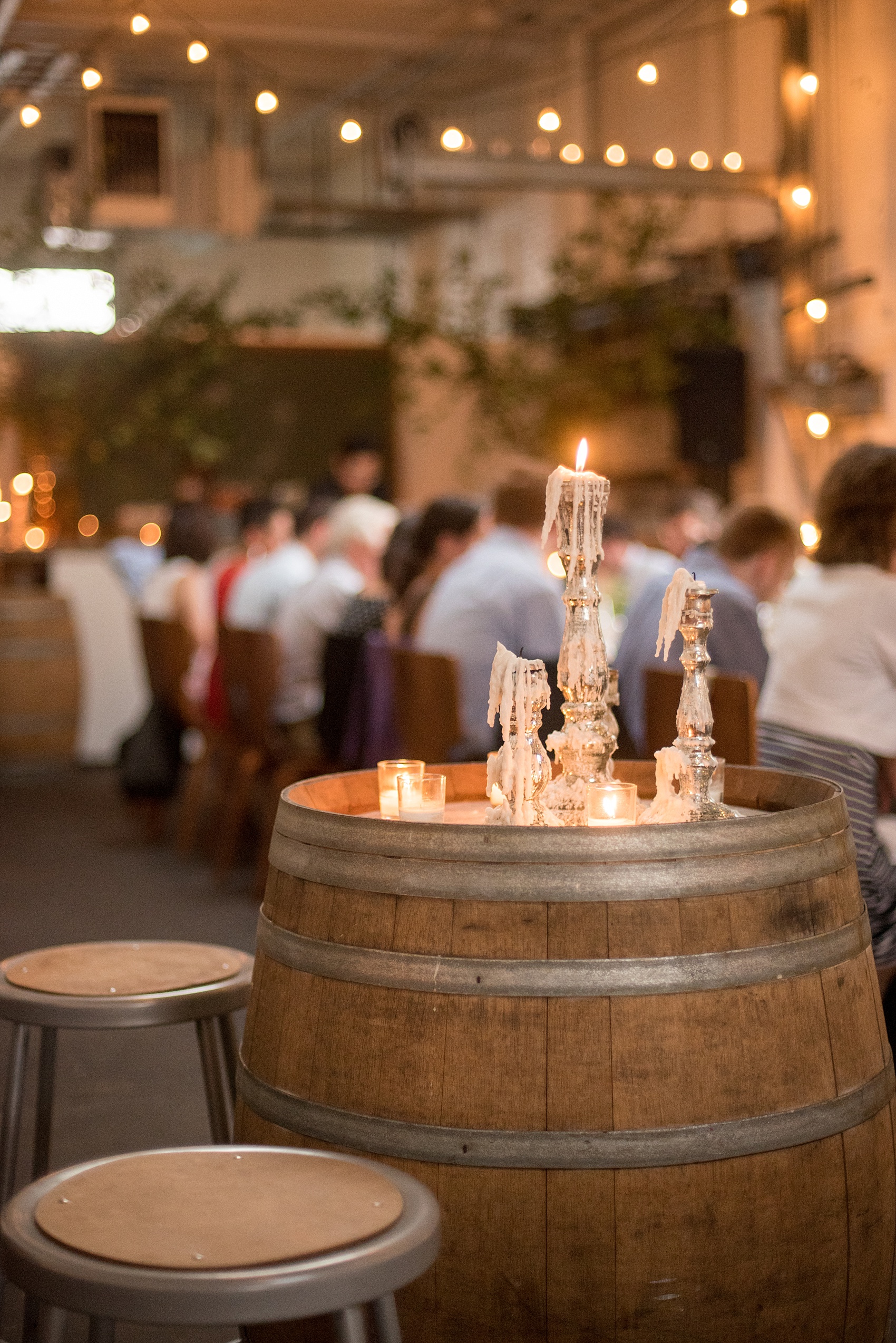 Mikkel Paige Photography photos of a wedding rehearsal dinner at Aterlier Roquette, Brooklyn. A romantic intimate setting for a small gathering in a warehouse district with an outside courtyard and candlelight.