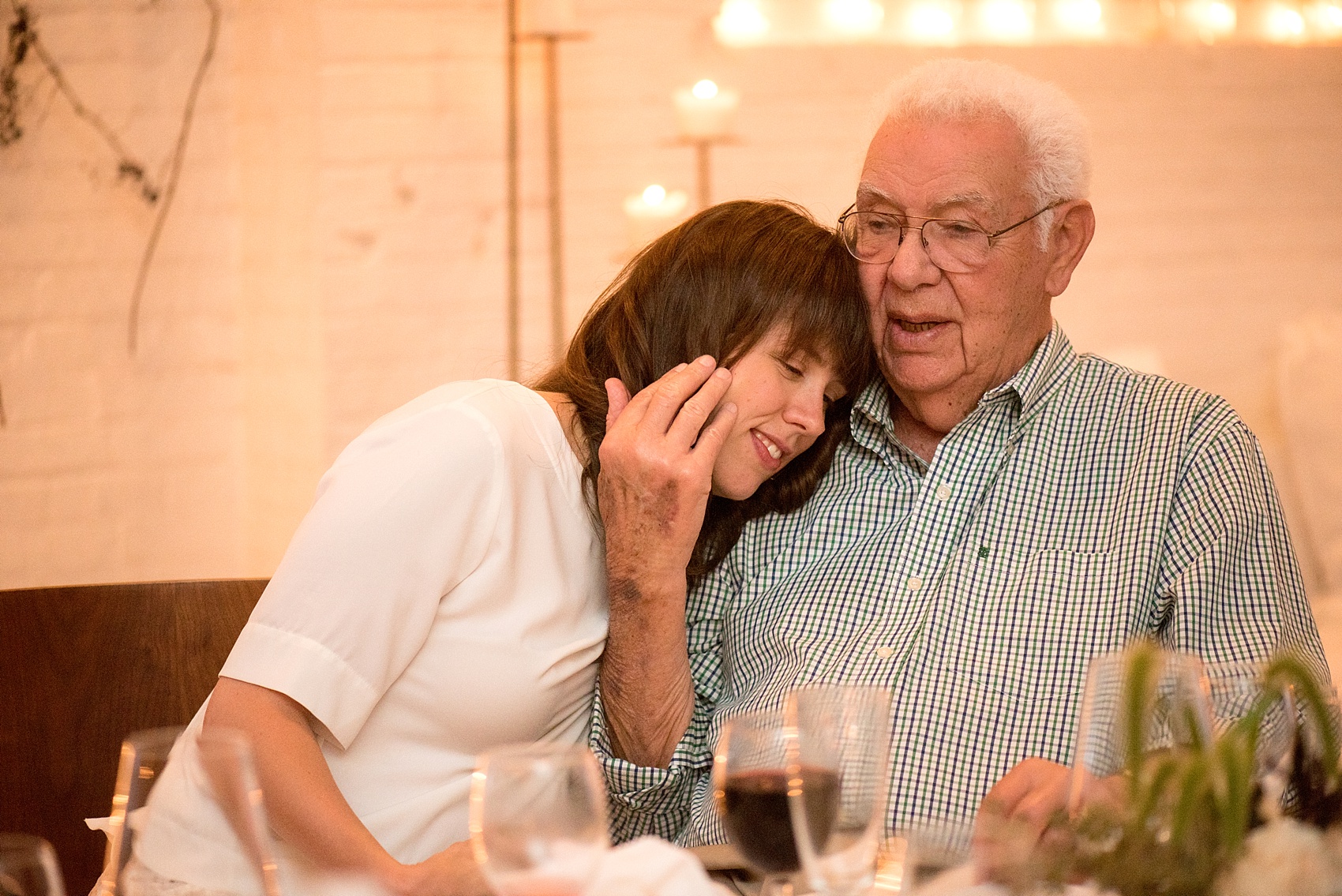 Mikkel Paige Photography photos of a wedding rehearsal dinner at Aterlier Roquette, Brooklyn. A romantic intimate setting for a small gathering in a warehouse district with an outside courtyard and candlelight.