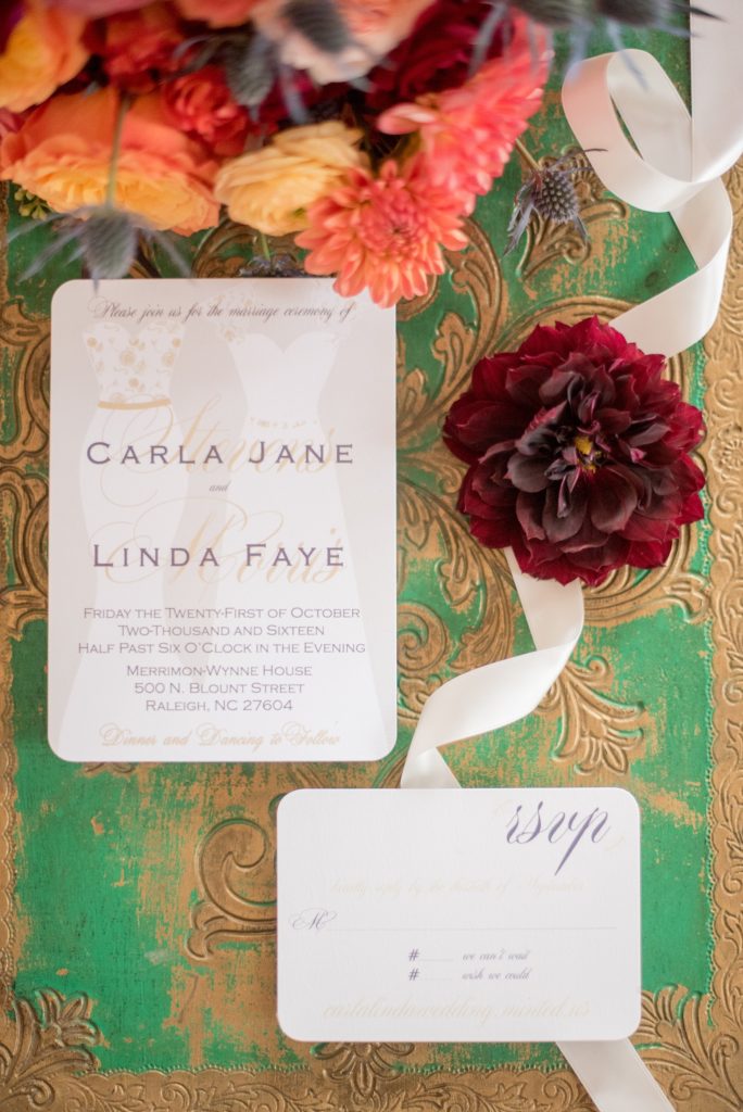 Mikkel Paige Photography photos from a Merrimon-Wynne House wedding in downtown Raleigh. An invitation with bridal gowns on it for a lesbian autumn wedding.