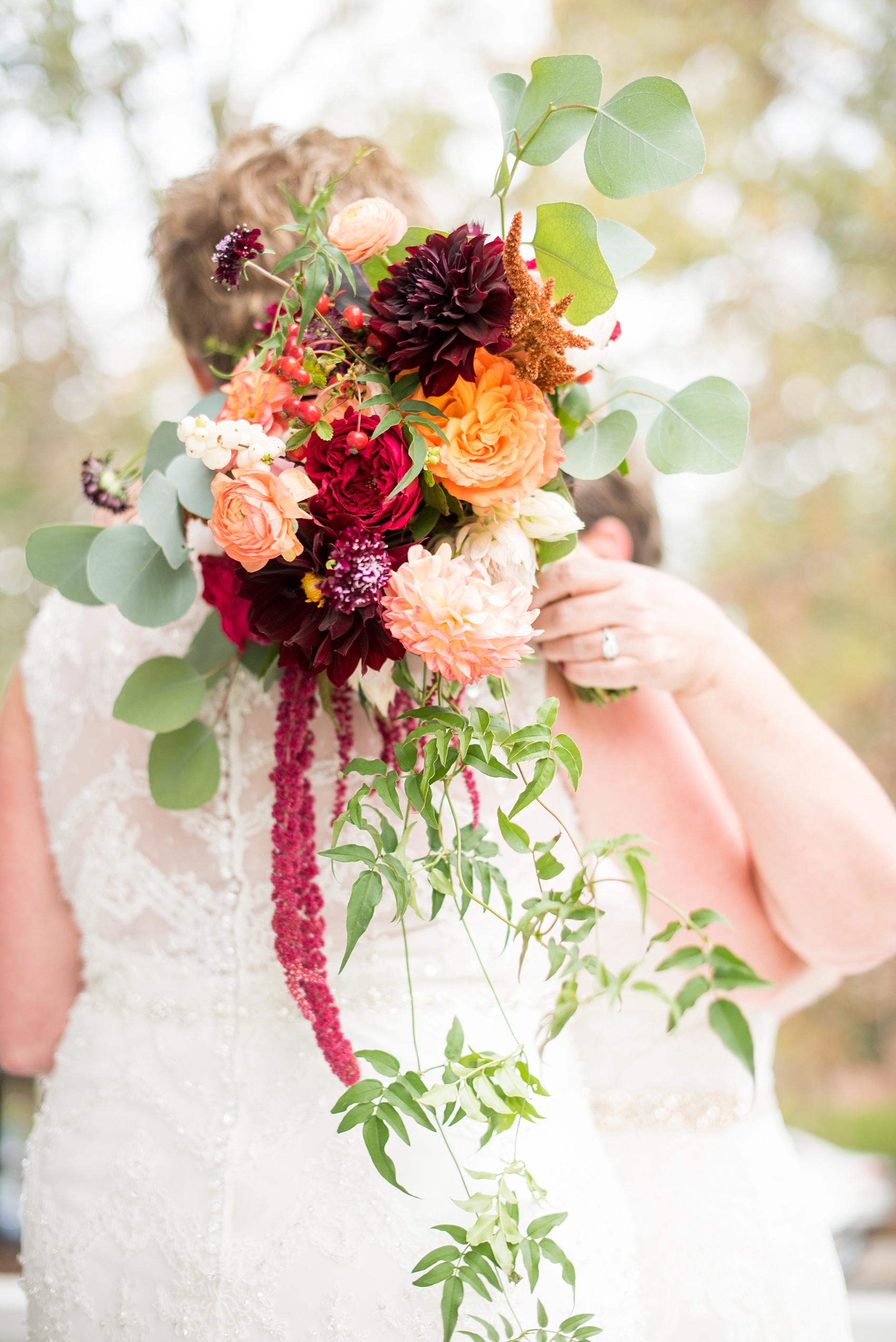 Mikkel Paige Photography photos from a Merrimon-Wynne House wedding in Raleigh. Fall floral bouquet by Meristem Floral for a same-sex wedding.