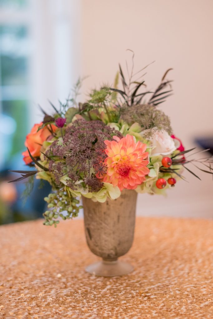 Mikkel Paige Photography photos from a Merrimon-Wynne House wedding in Raleigh. Cocktail hour was inside the southern mansion complete with gold sequin tablecloths and fall flowers.