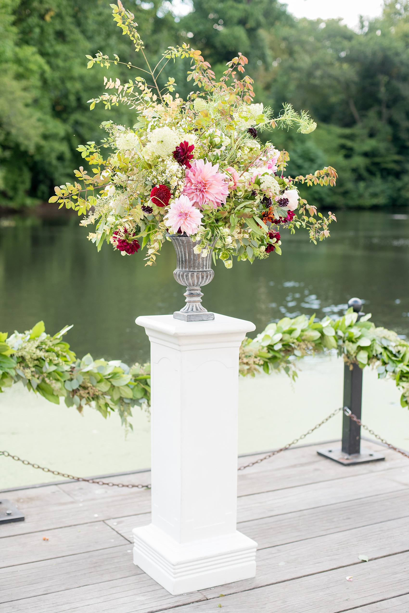 Mikkel Paige Photography photo of an outdoor ceremony floral piece at a Prospect Park Boathouse wedding