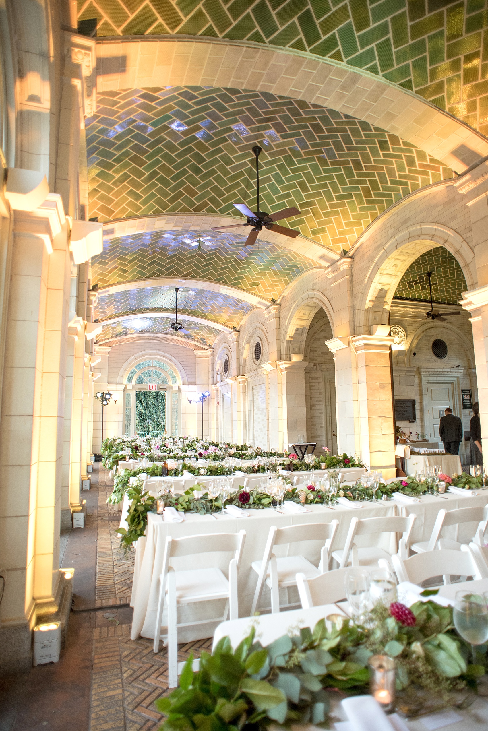 Mikkel Paige Photography photos of a wedding at Brooklyn's Prospect Park Boathouse with floral garland by Sachi Rose.