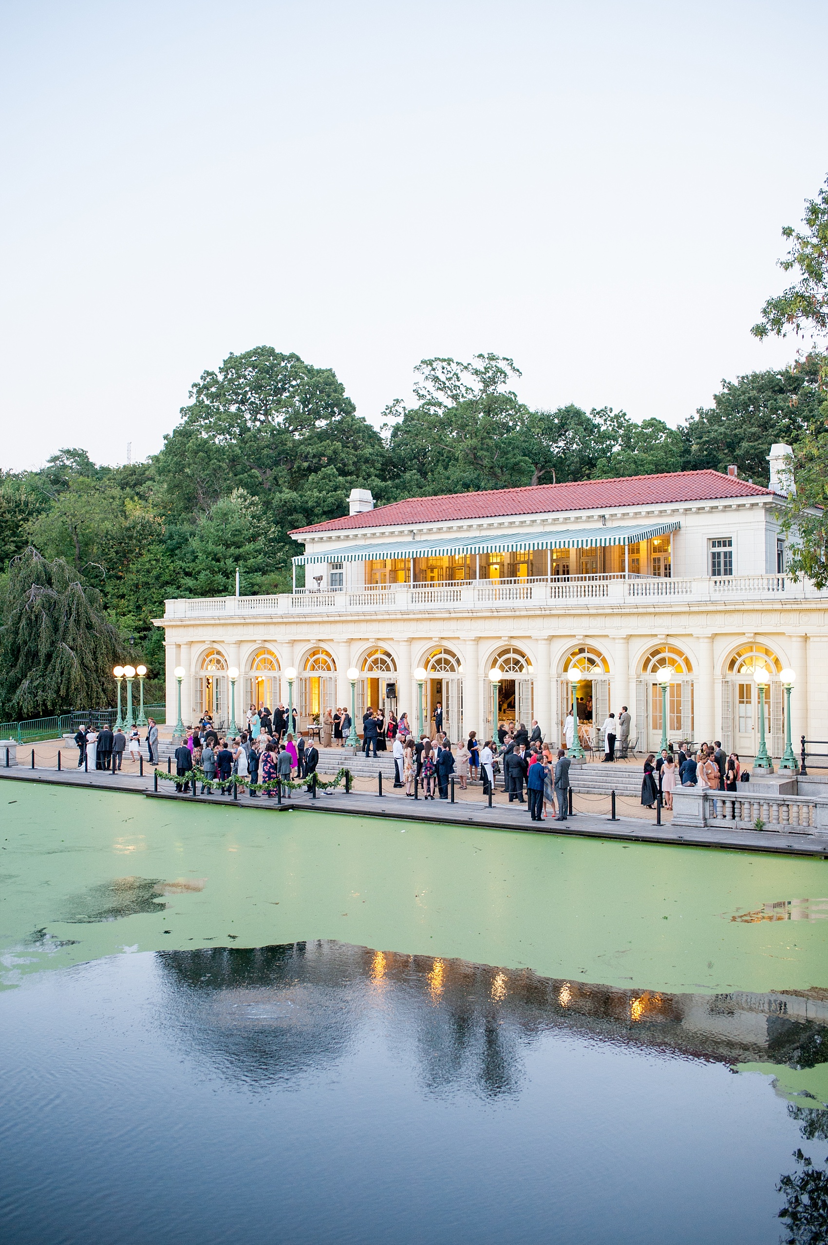 Mikkel Paige Photography photos of a wedding at Brooklyn's Prospect Park Boathouse with an outdoor waterfront cocktail hour.