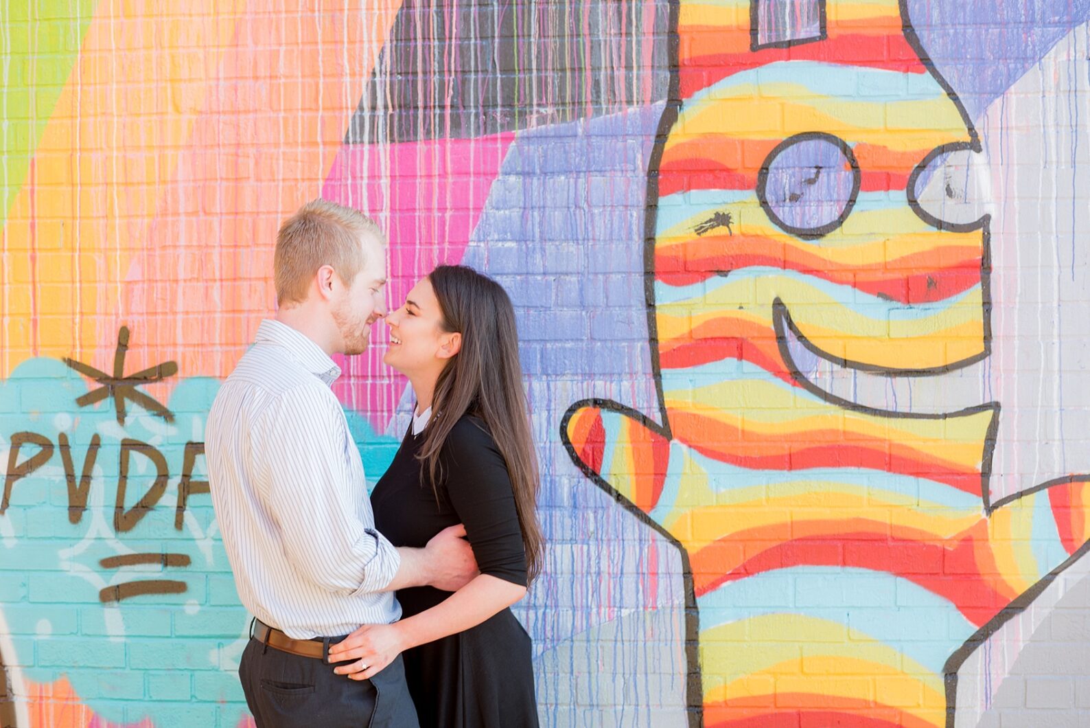 Mikkel Paige Photography photos of a colorful downtown Raleigh engagement session.