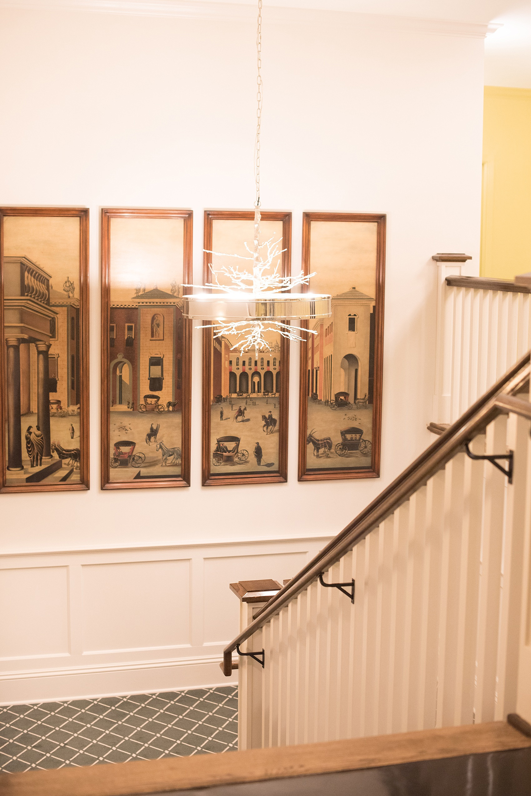 Mikkel Paige Photography, Raleigh wedding photographer, photos of The Mayton Inn hotel and venue in Cary, NC. Staircase detail with branch lighting fixture.