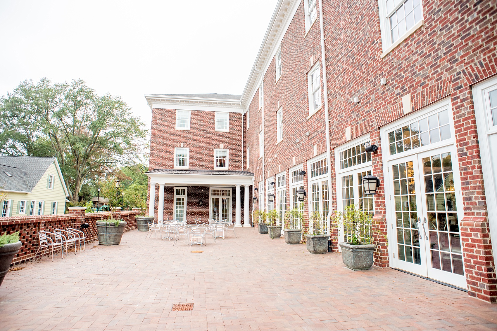 Mikkel Paige Photography, Raleigh wedding photographer, photos of The Mayton Inn hotel and venue in Cary, NC. Outdoor patio and ceremony area.