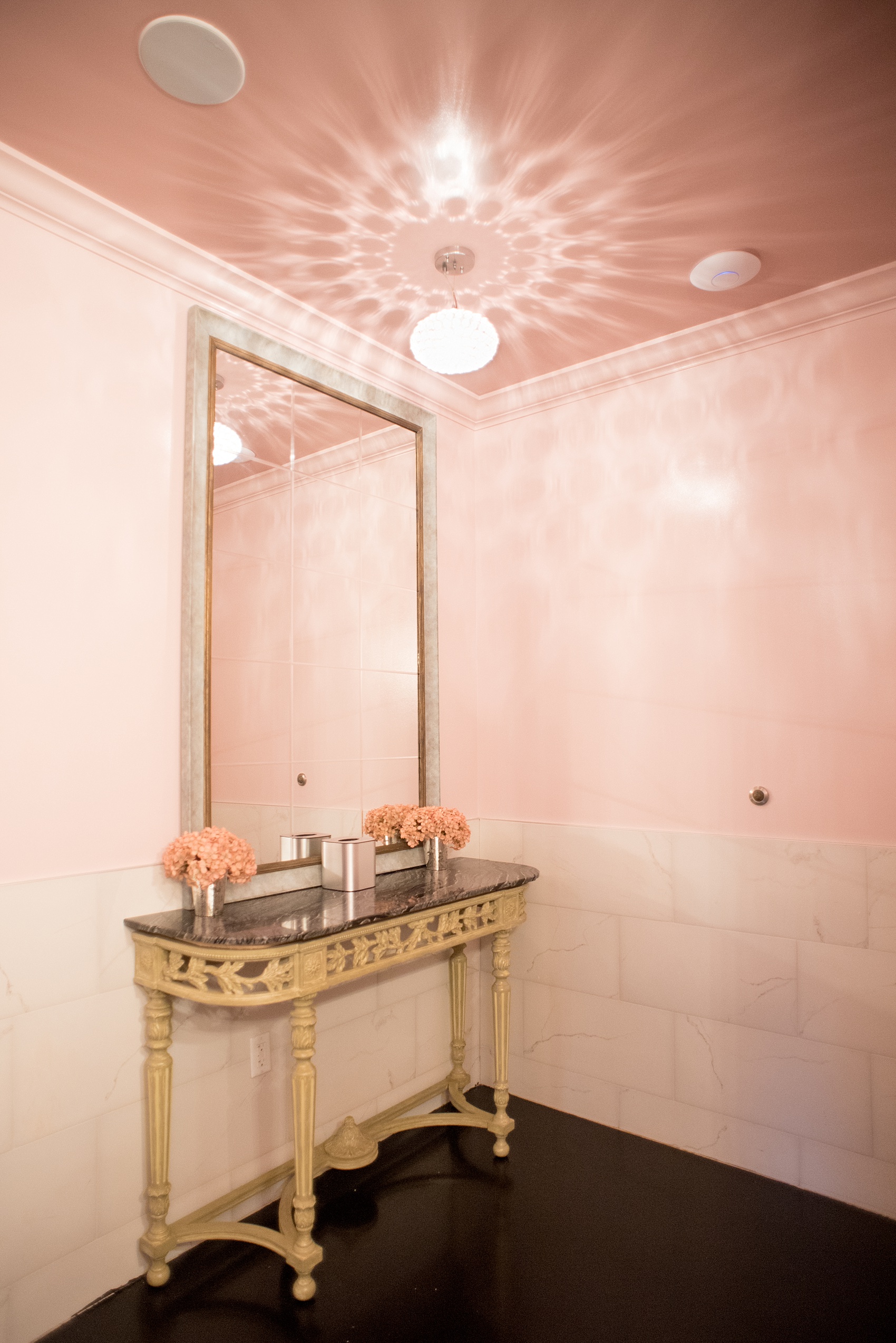 Mikkel Paige Photography, Raleigh wedding photographer, photos of The Mayton Inn hotel and venue in Cary, NC. Pink women's restroom decorating detail.