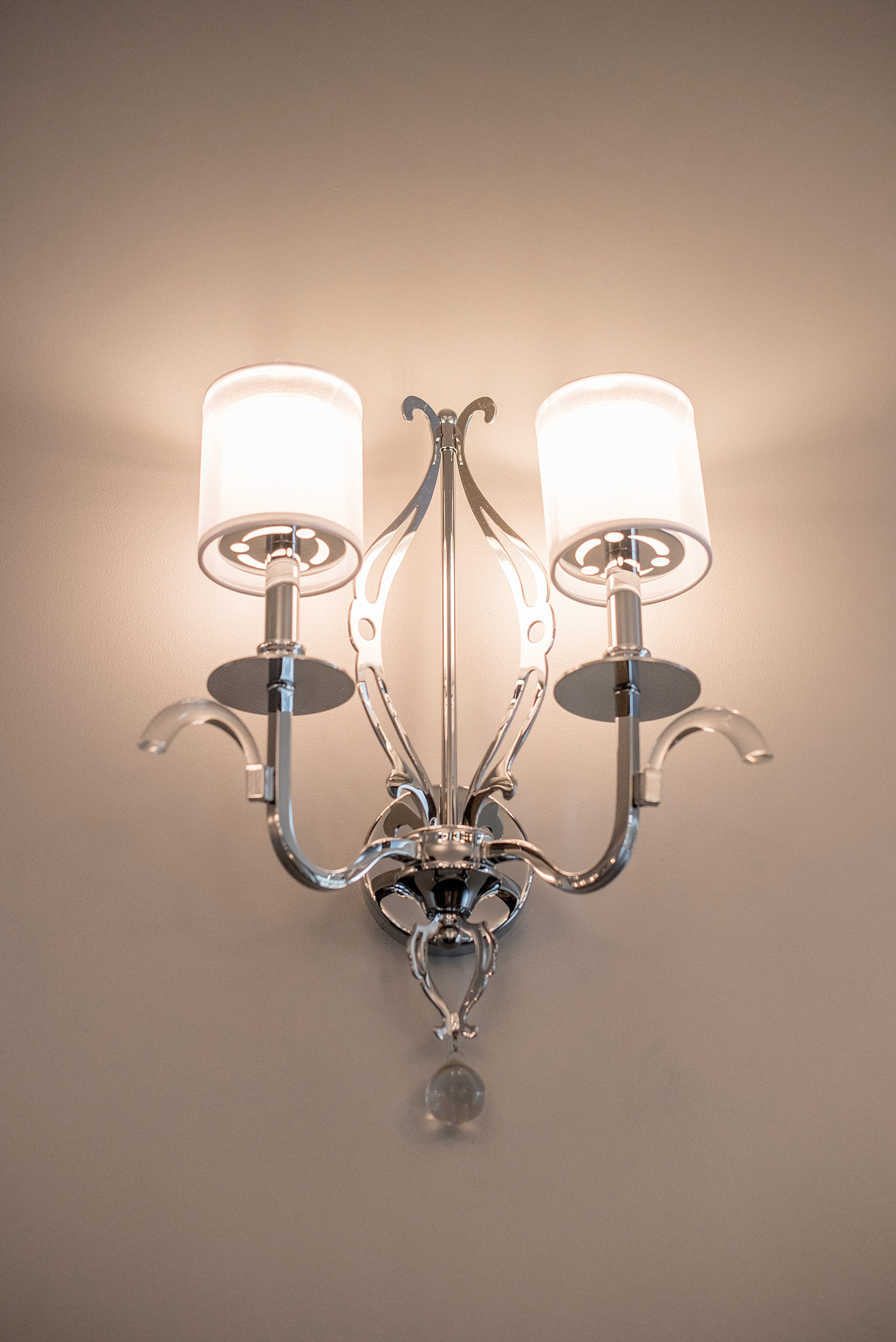 Mikkel Paige Photography, Raleigh wedding photographer, photos of The Mayton Inn hotel and venue in Cary, NC. Silver modern sconce detail.