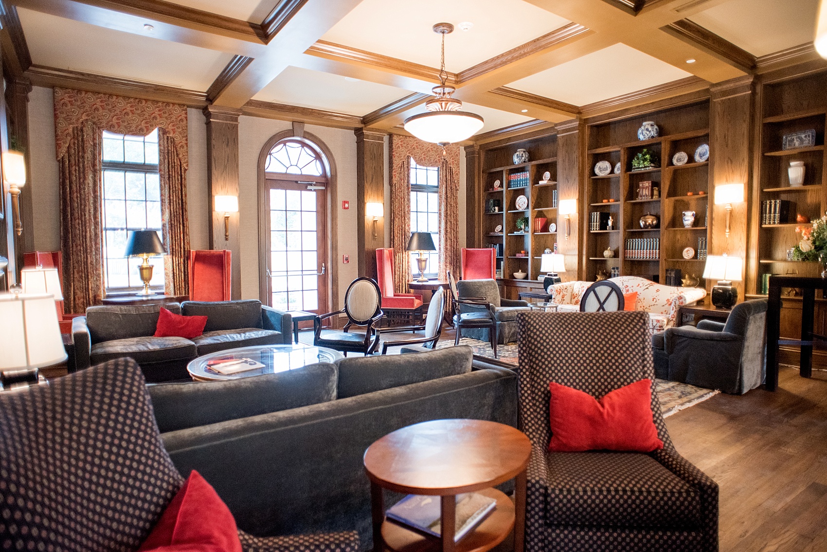 Mikkel Paige Photography, Raleigh wedding photographer, photos of The Mayton Inn hotel and venue in Cary, NC. Sitting room detail with upholstered chairs with black and white fabric houndstooth detail.