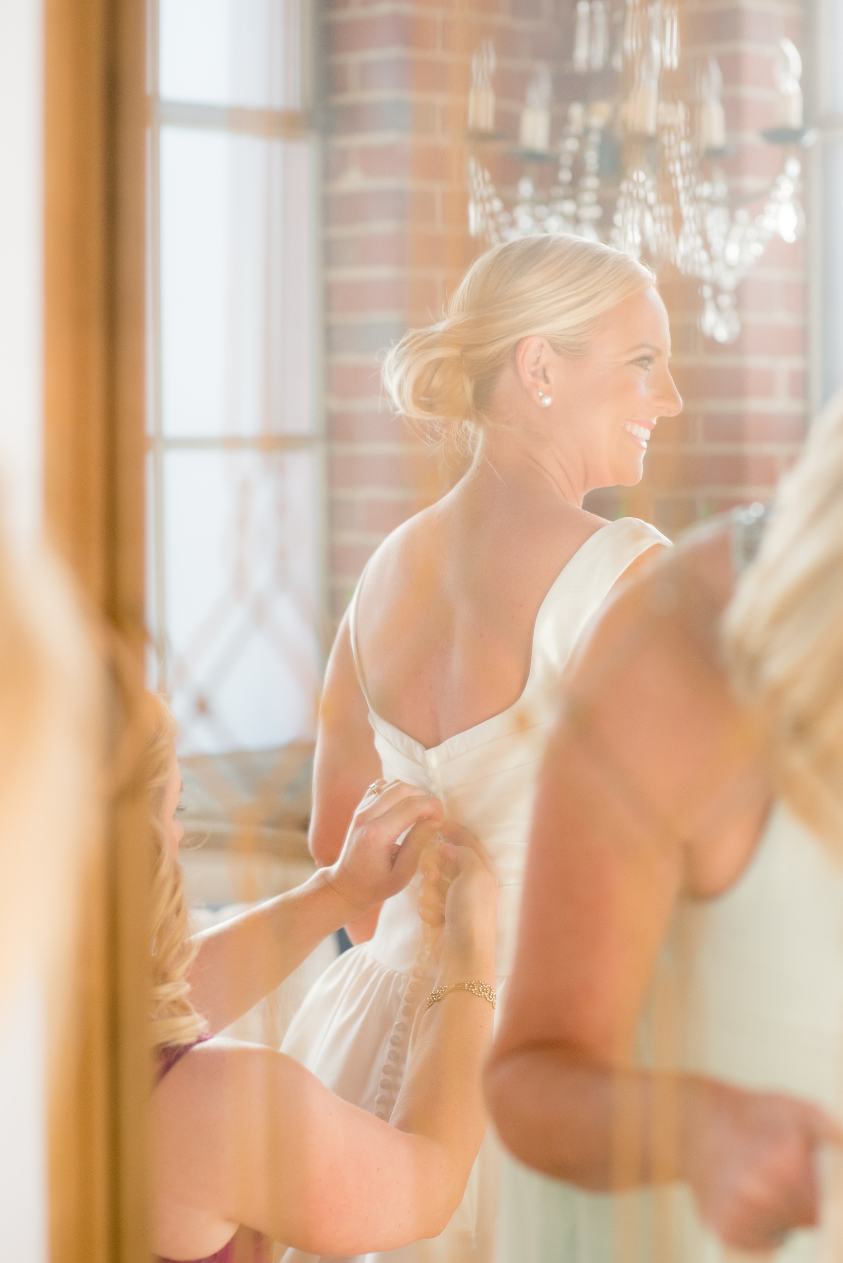 Mikkel Paige Photography photo of a wedding at The Rickhouse, Durham. The bride prepares in the bridal suite.