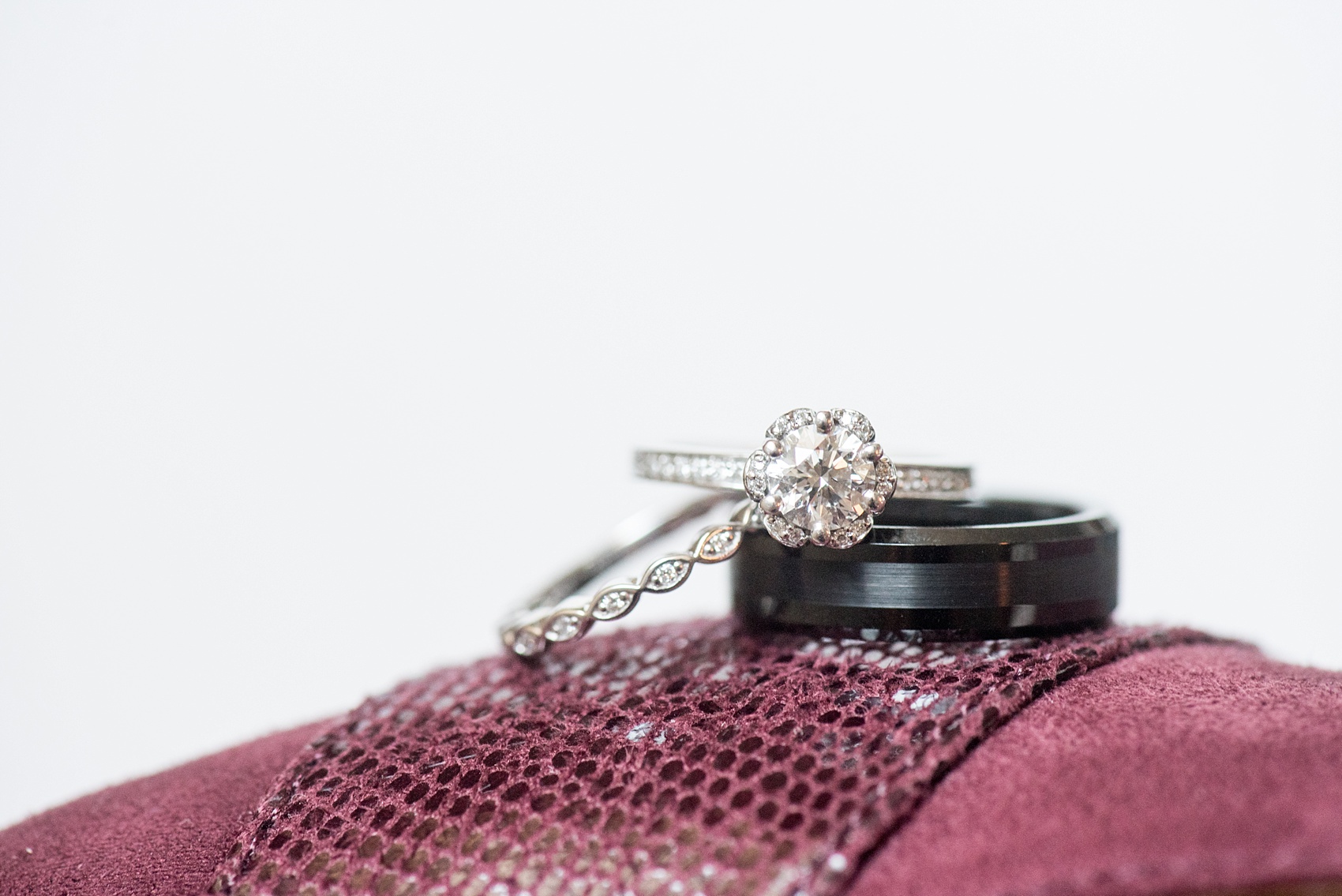 Mikkel Paige Photography photos from a 214 Martin Street downtown Raleigh wedding with a detail image of their rings.