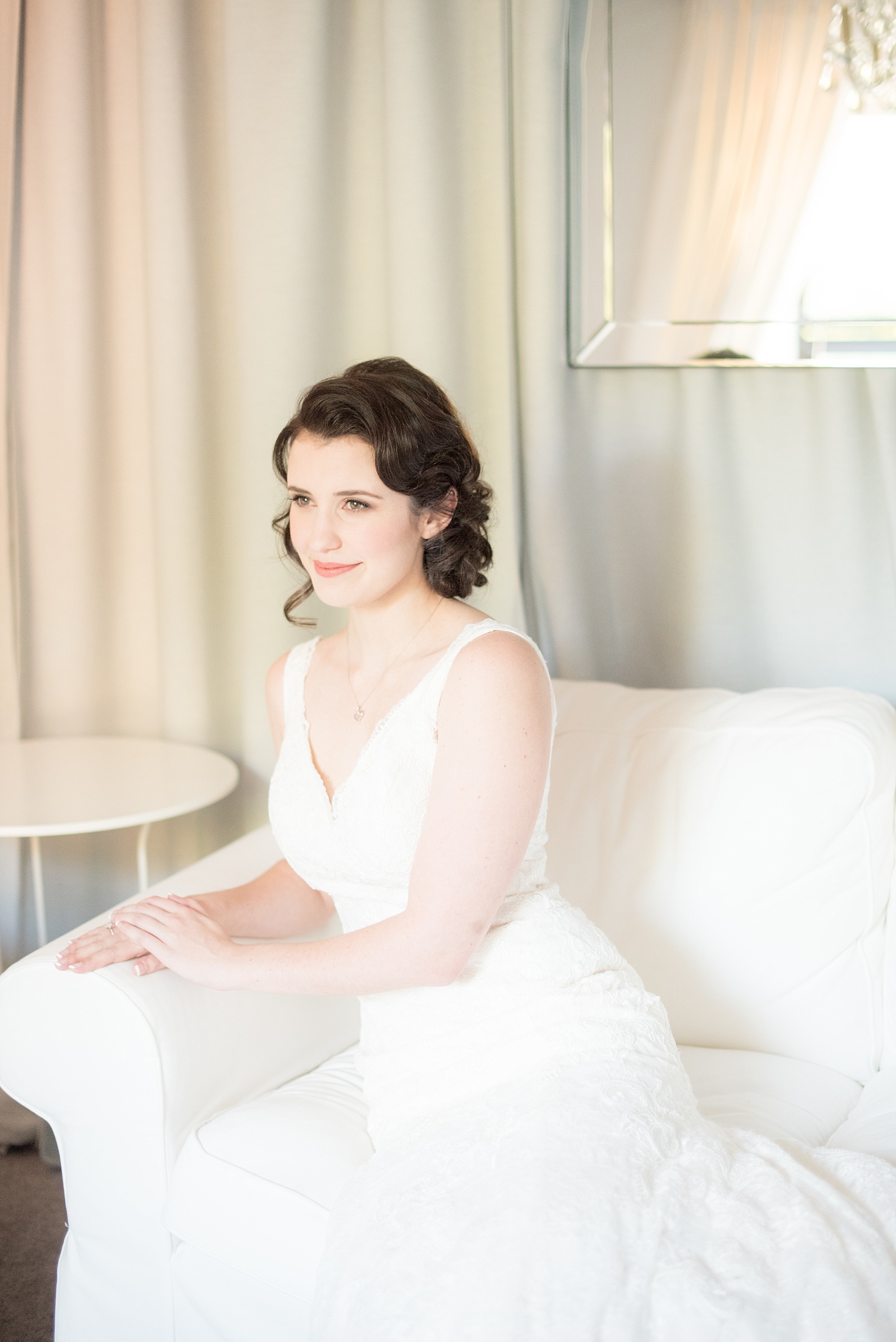 Mikkel Paige Photography photo of a bride in The White Room in downtown Raleigh for a North Carolina wedding.