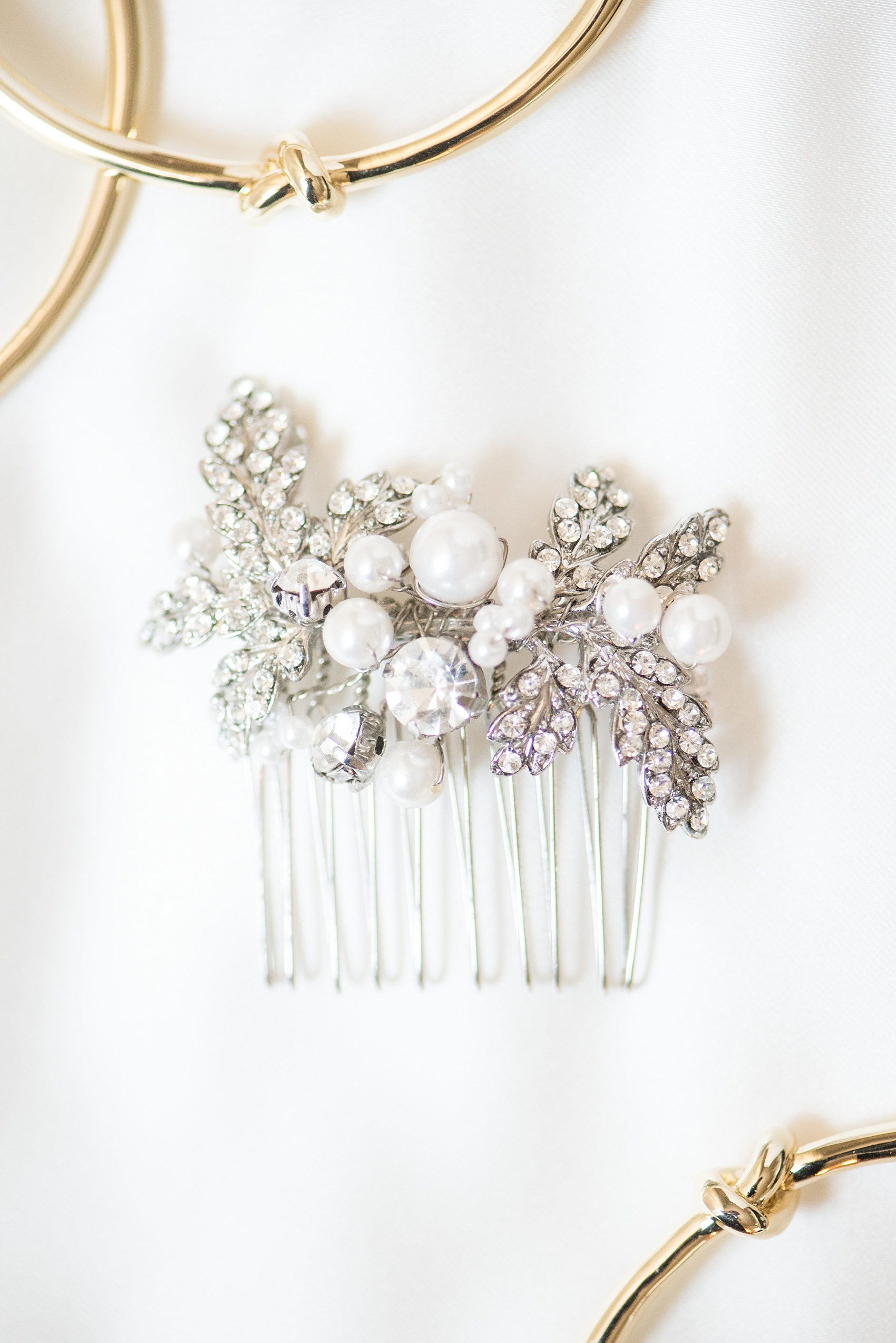 Mikkel Paige Photography photo of a bridal hair comb for a wedding at 214 Market St in downtown Raleigh.