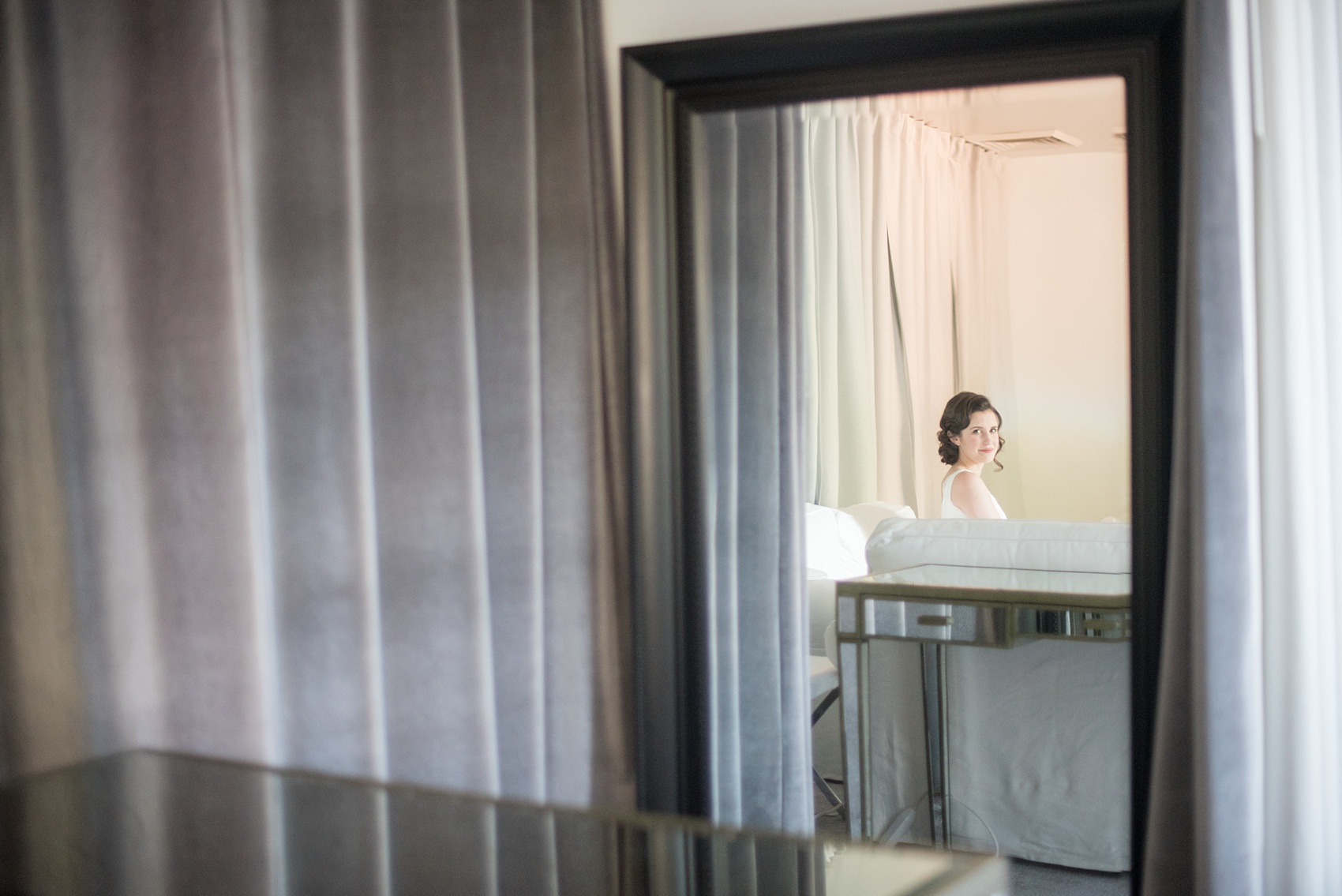 Mikkel Paige Photography photo of a bride in The White Room in downtown Raleigh for a North Carolina wedding.