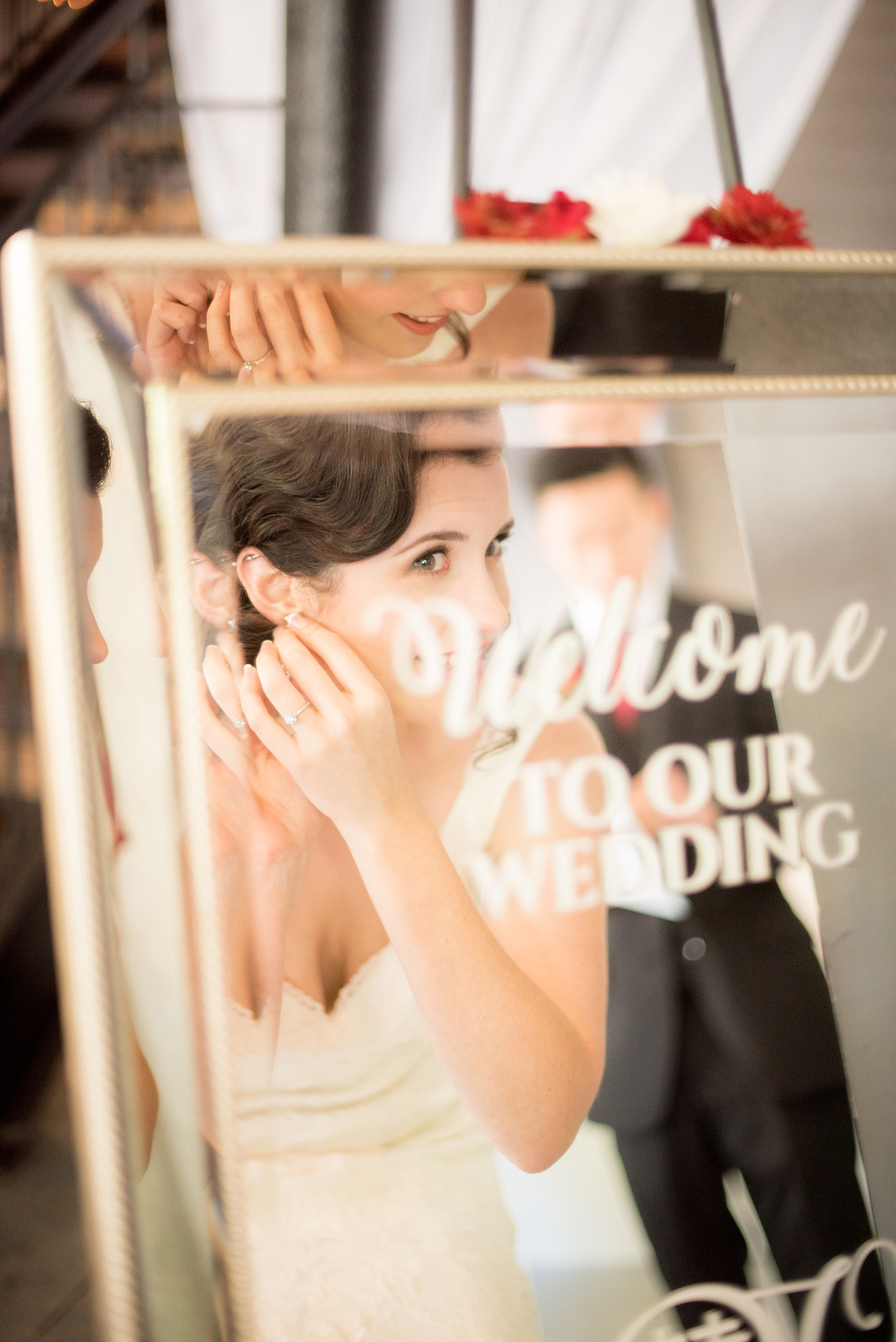 Mikkel Paige Photography photo of bride preparing for her wedding at 214 Martin Street in downtown Raleigh wedding.