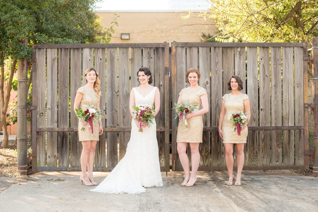 Mikkel Paige Photography photos of a fall wedding in downtown Raleigh with bridesmaids in short gold dresses by Adriana Papell.