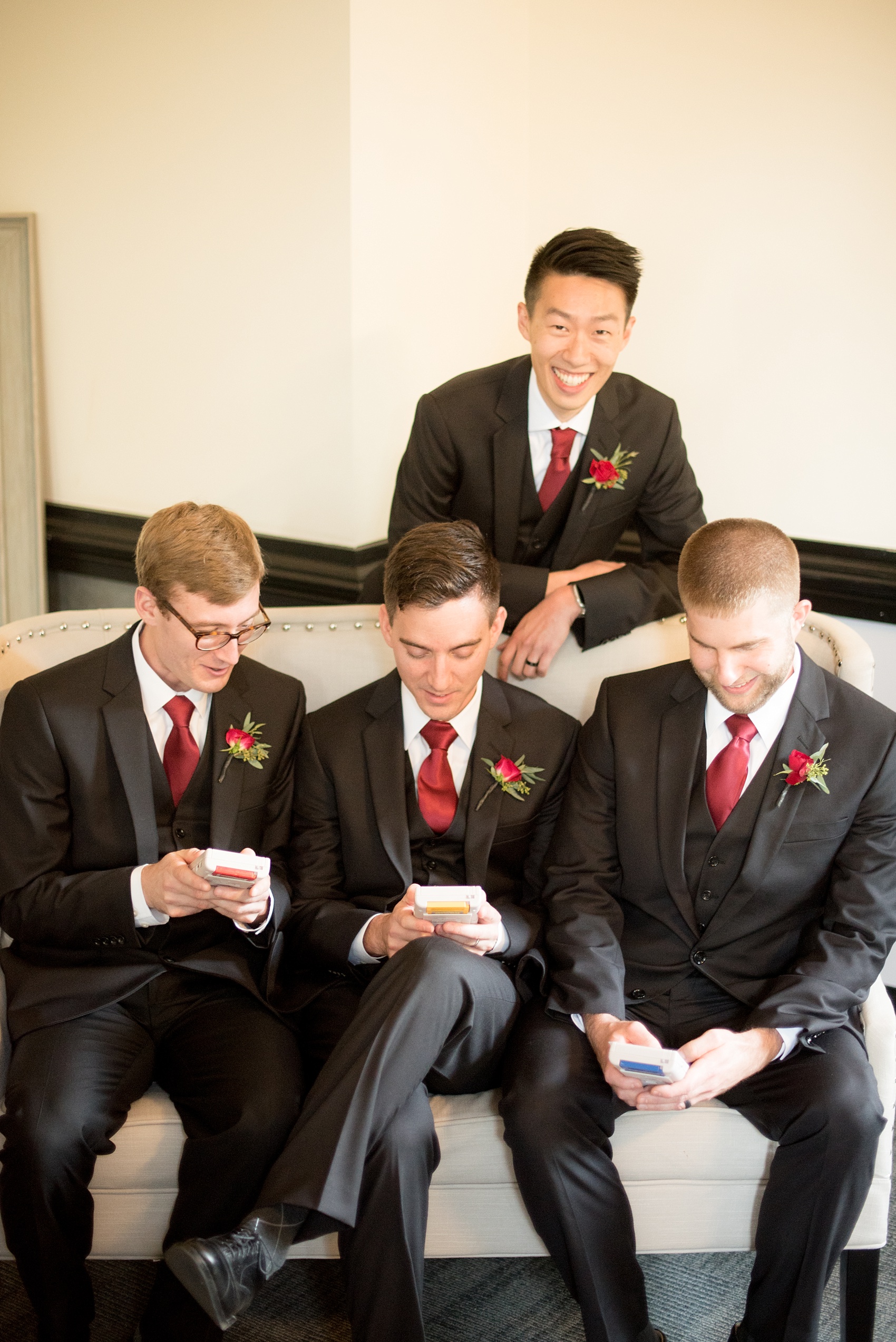 Mikkel Paige Photography detail image of a groomsmen gift: Game Boys! Wedding at 214 Martin Street in downtown Raleigh.