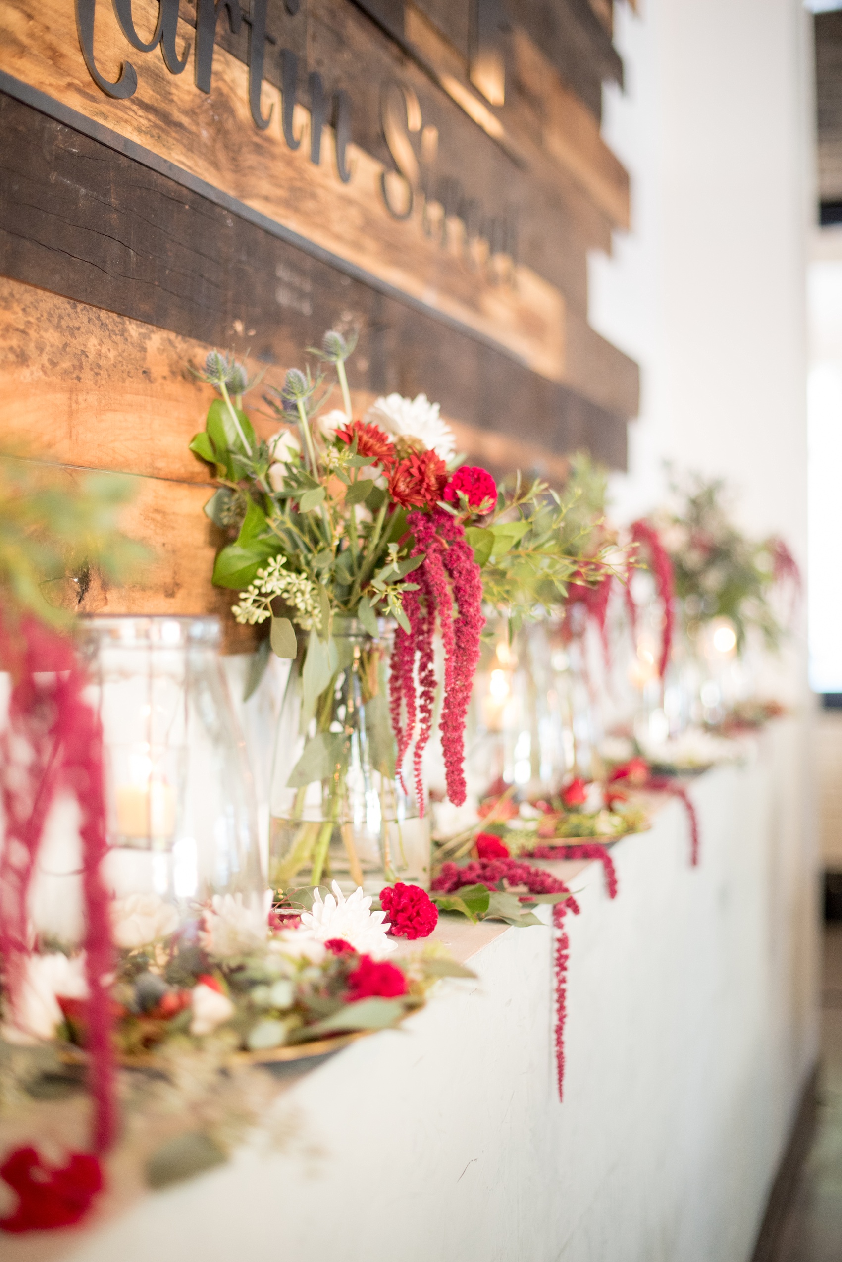 Mikkel Paige Photography photos from a wedding at 214 Martin Street in downtown Raleigh with fall flowers.