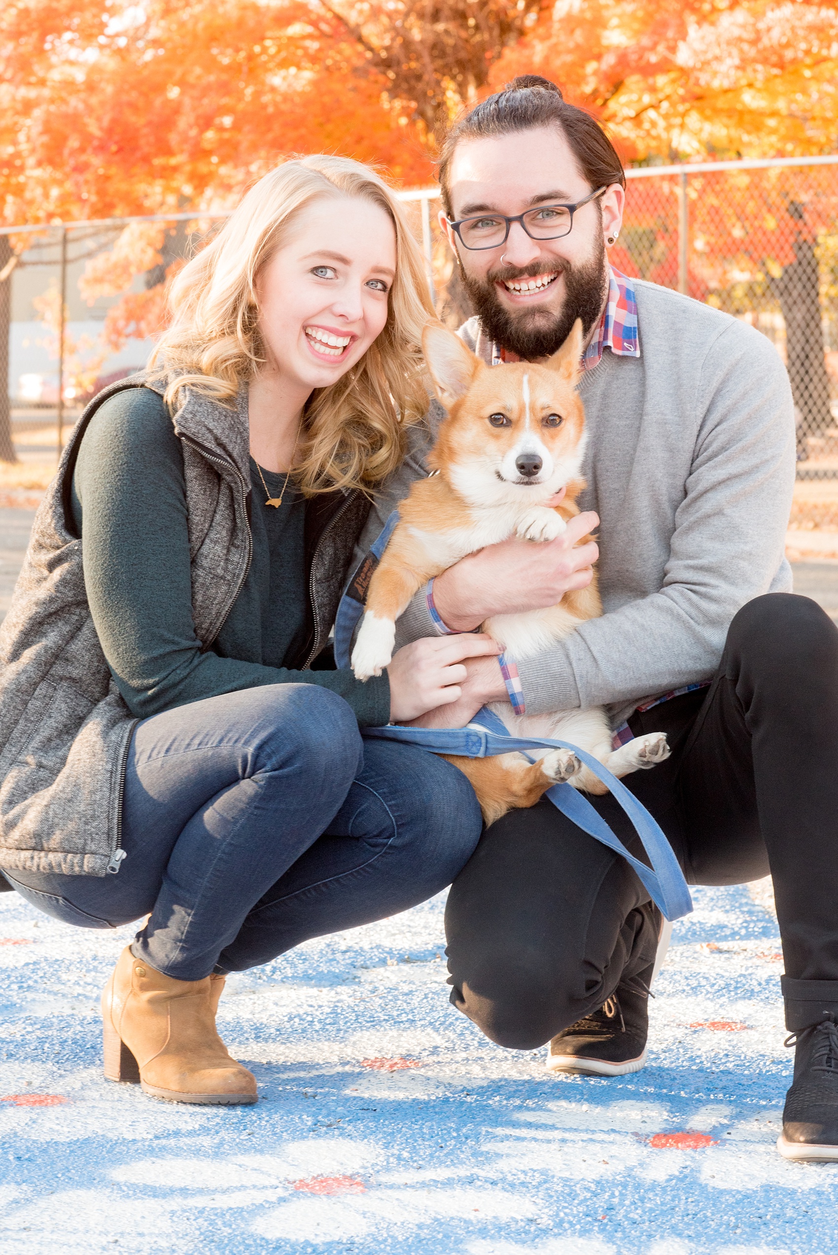 Mikkel Paige Photography photos of a Durham engagement session with the bride and groom's Corgi dog. 