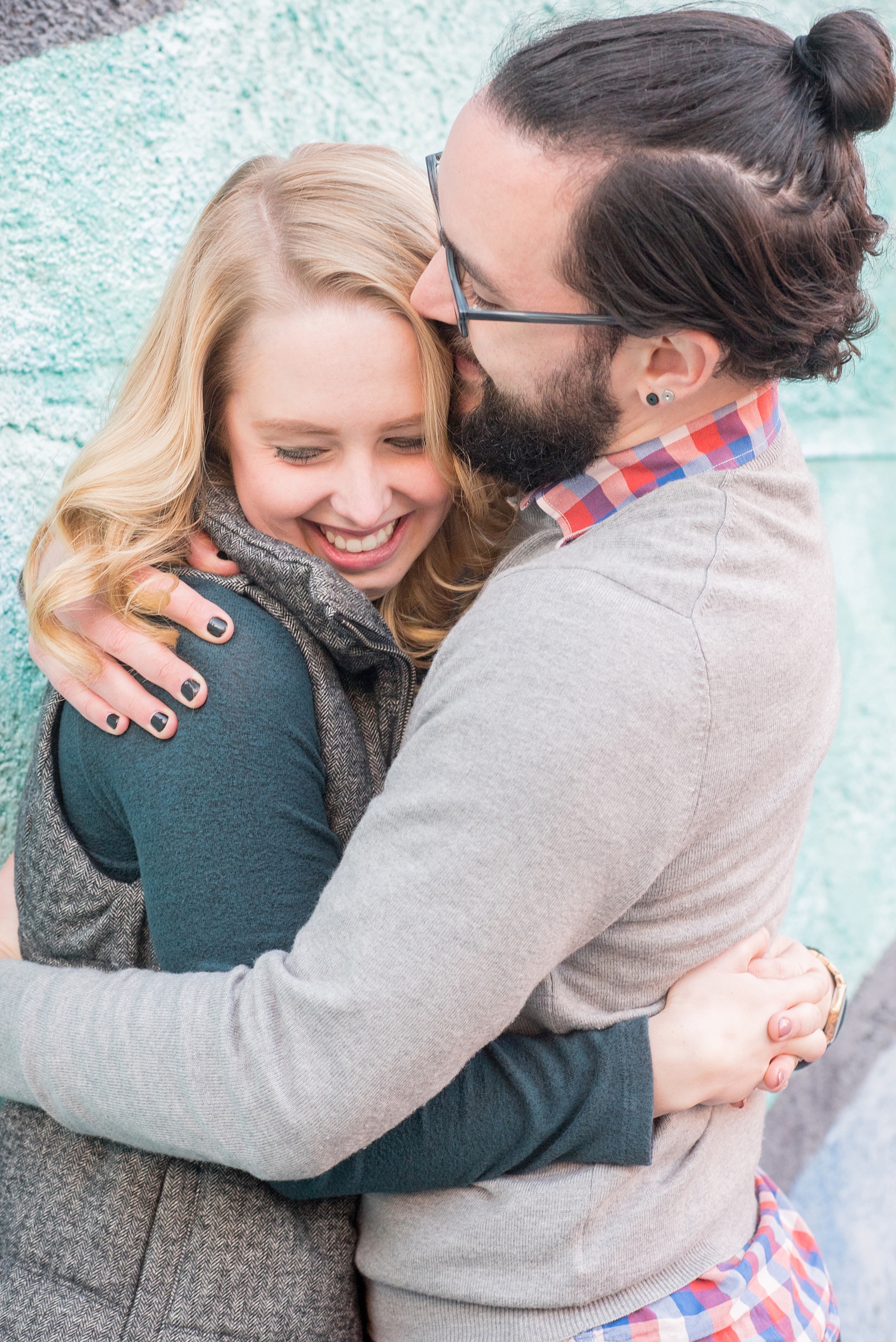 Mikkel Paige Photography photos of a Durham engagement session in downtown Durham. The couple wore cozy fall outfits.